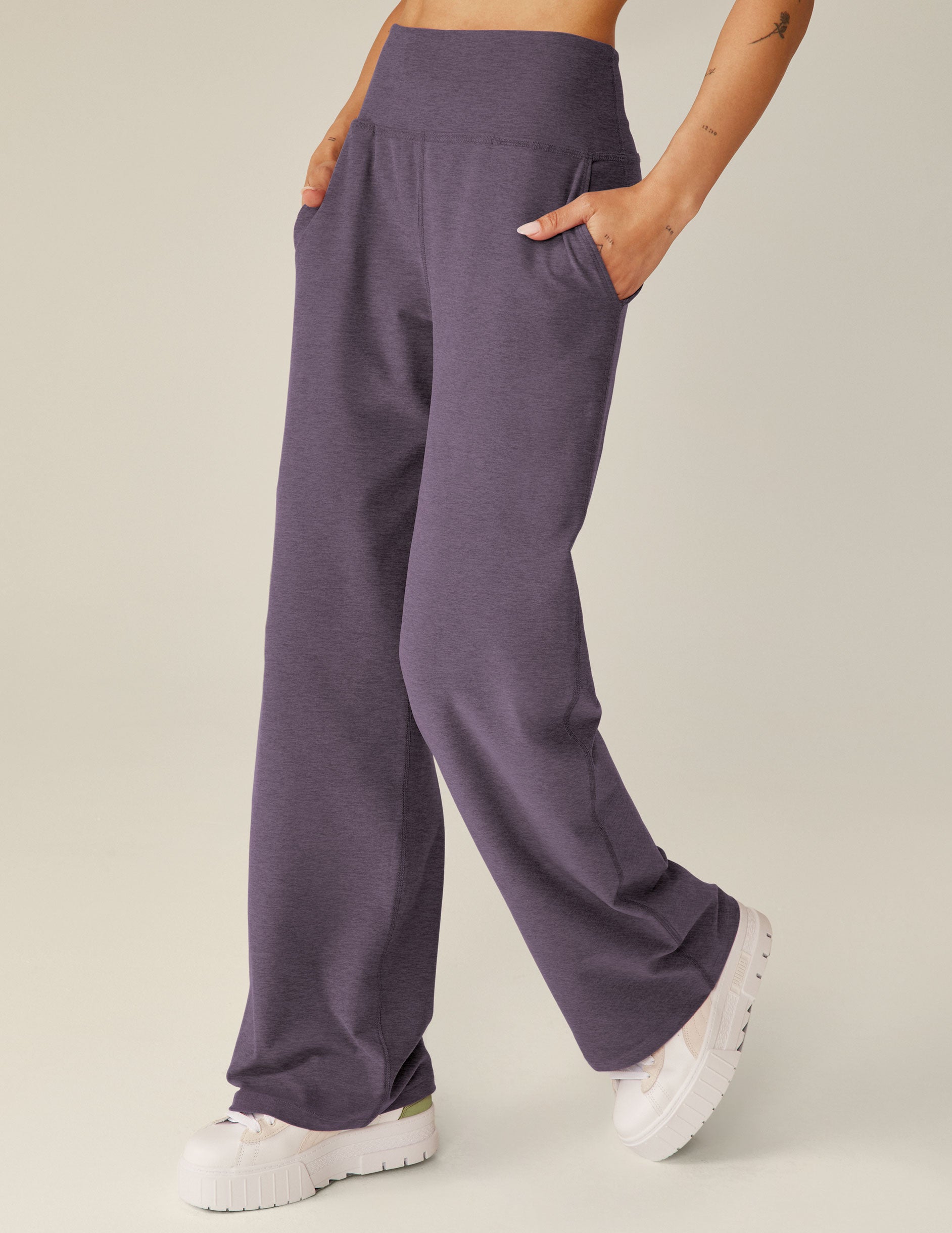 purple high waisted relaxed pants with pockets. 