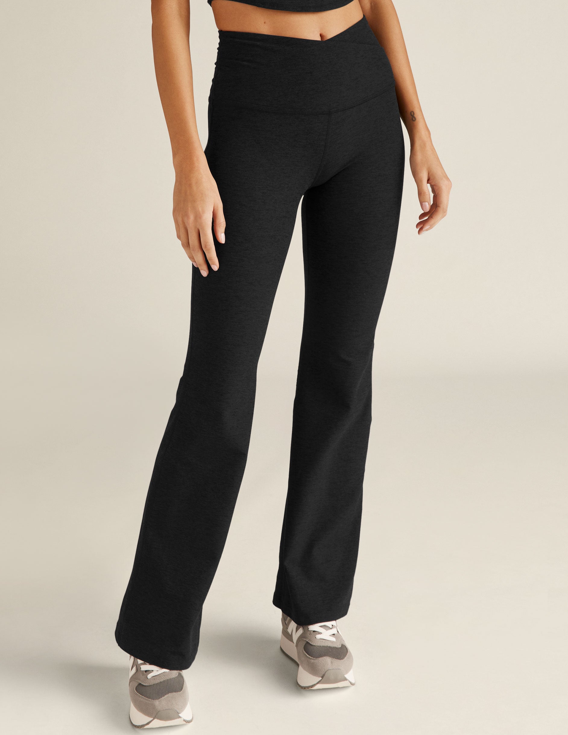 black midi flare pant with criss cross front detail