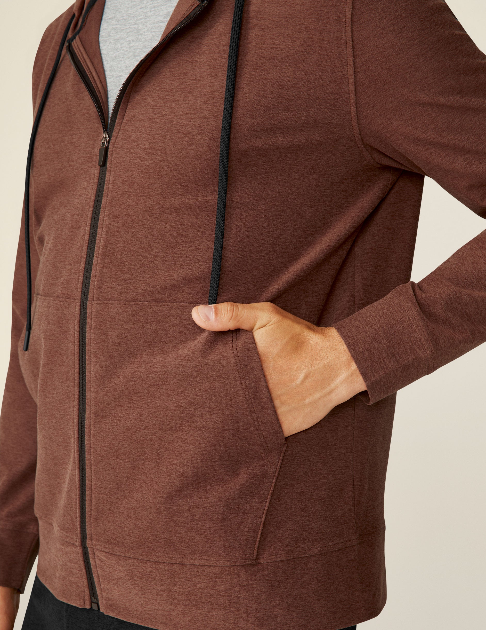 brown men's zip-up hoodie.