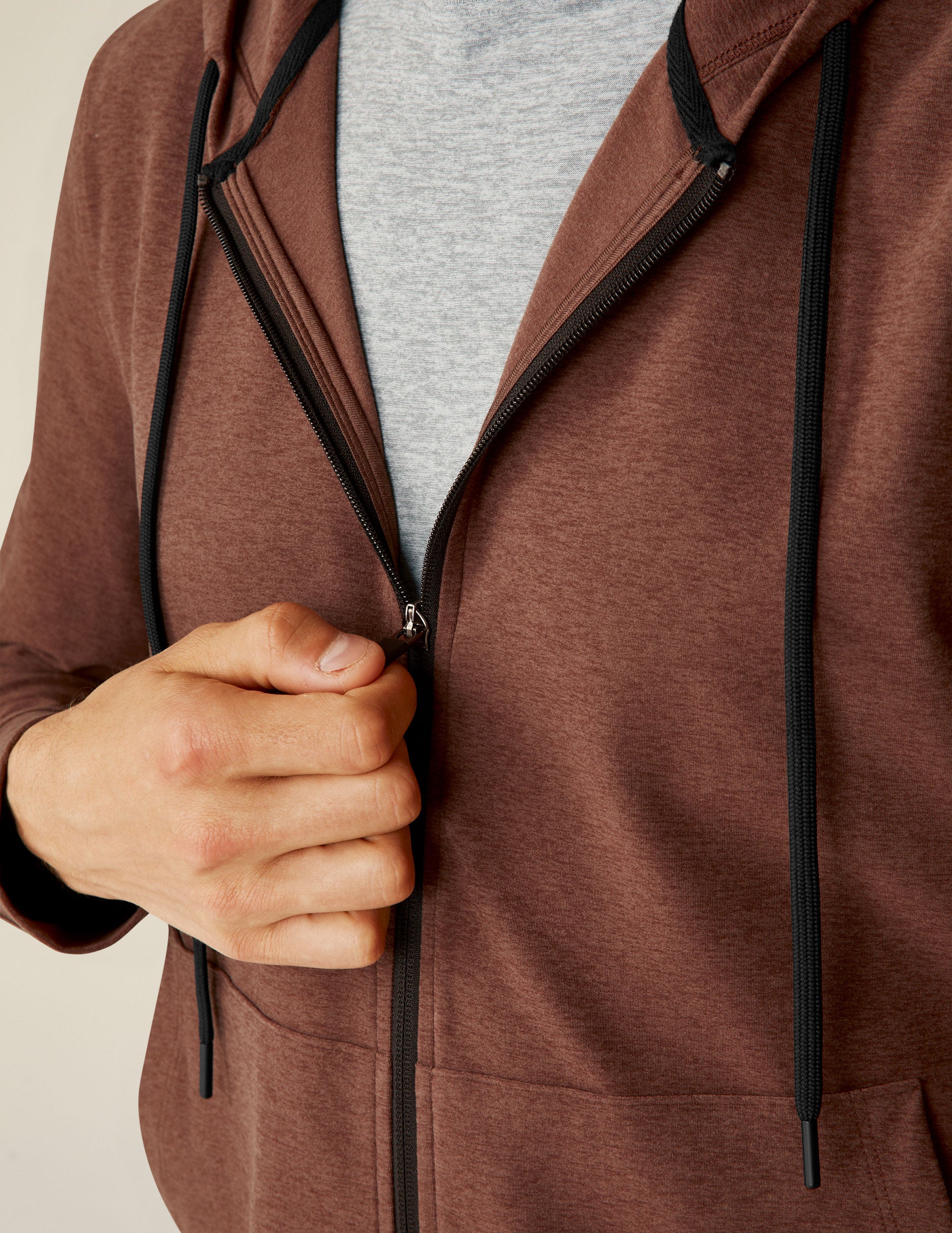 brown men's zip-up hoodie.