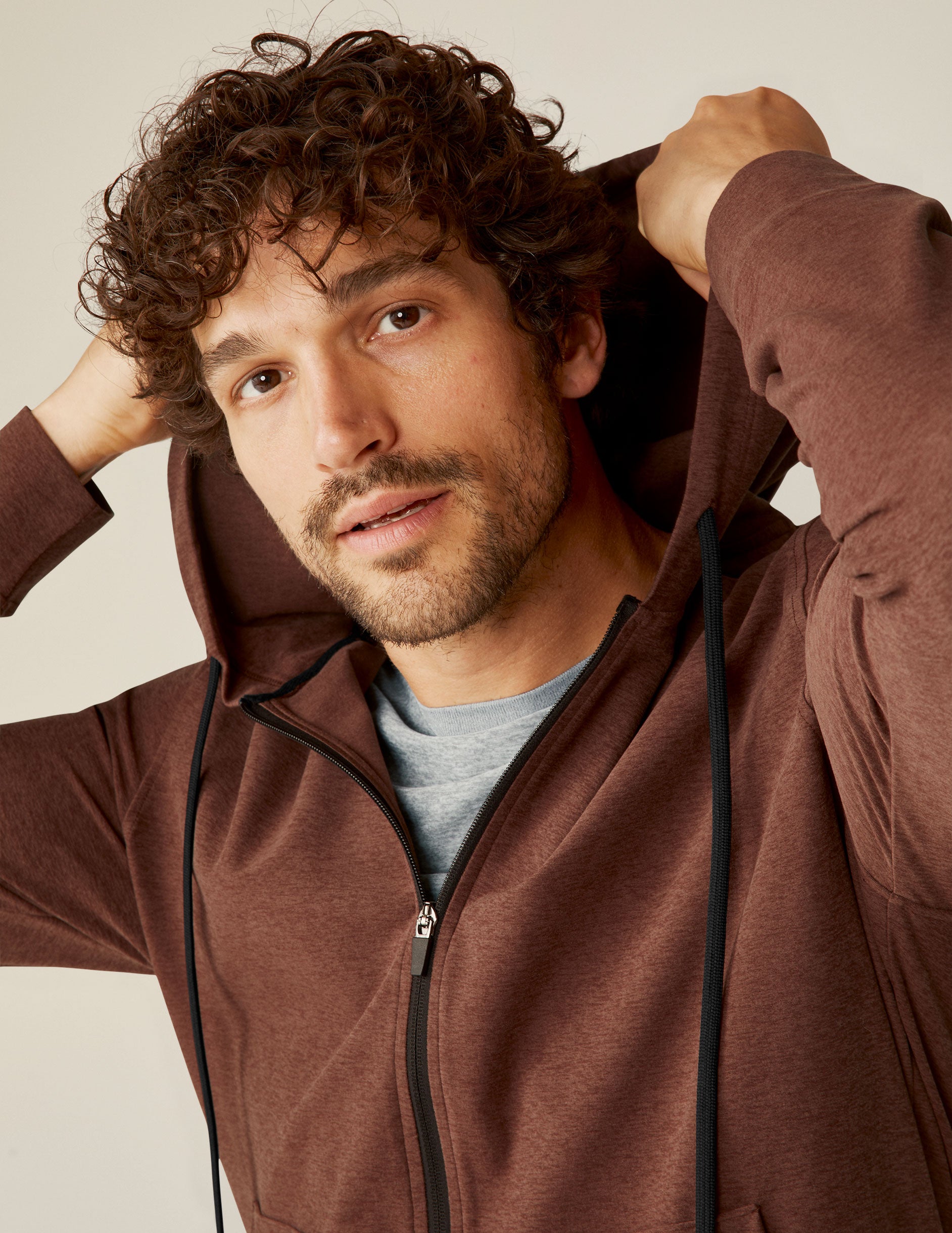 brown men's zip-up hoodie.