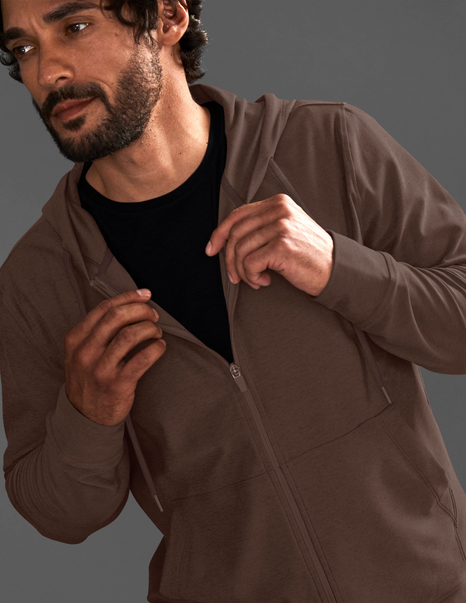 brown men's zip-up hoodie with pockets.