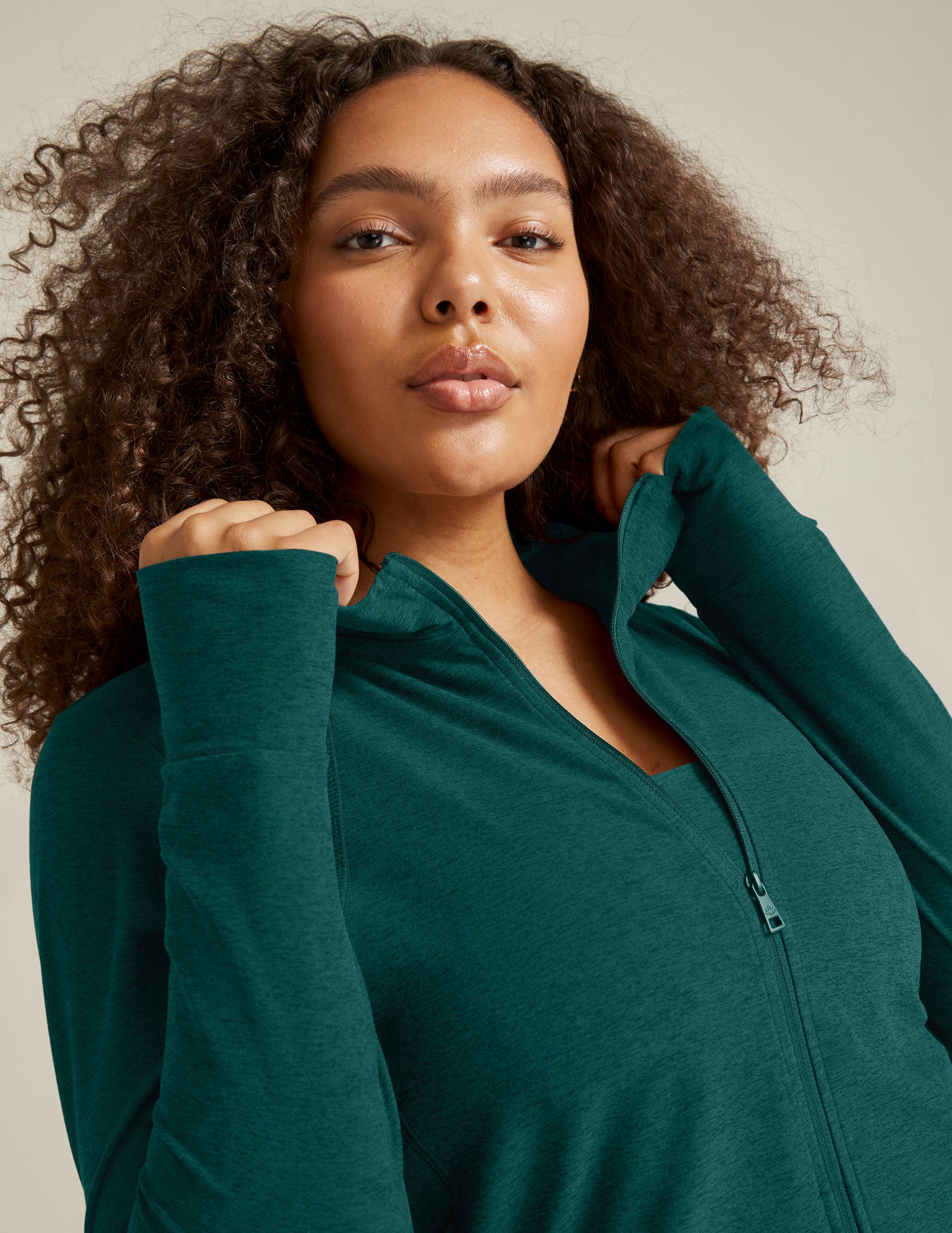 green zip-up hoodie
