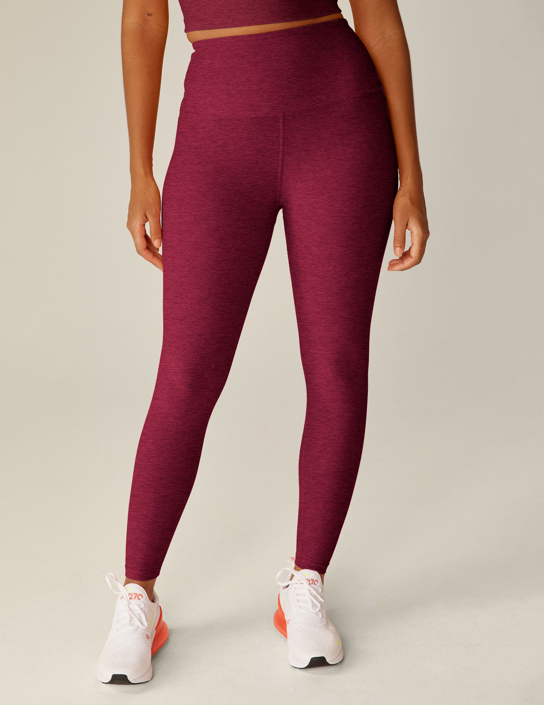 red high-waisted midi legging.