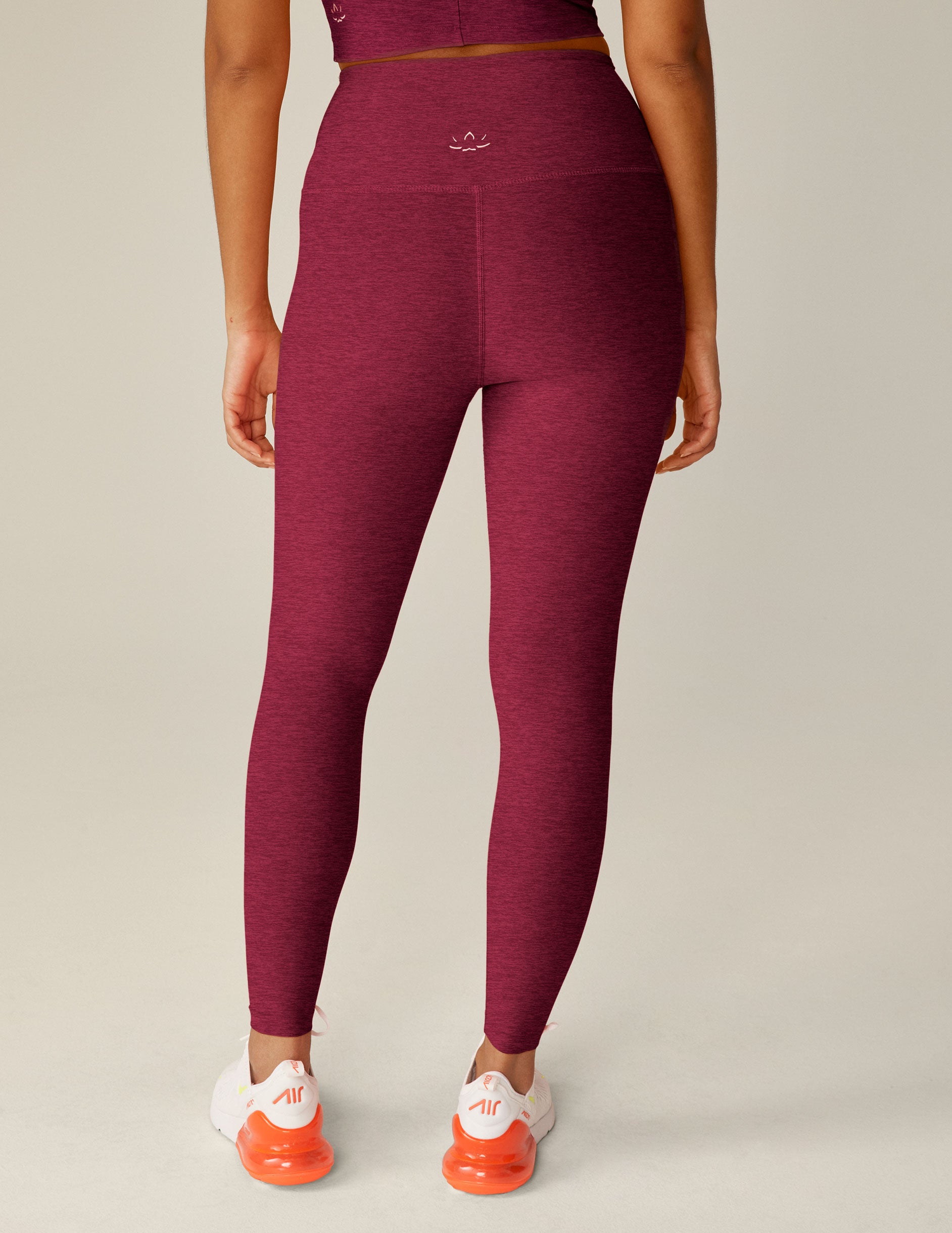 red high-waisted midi legging.