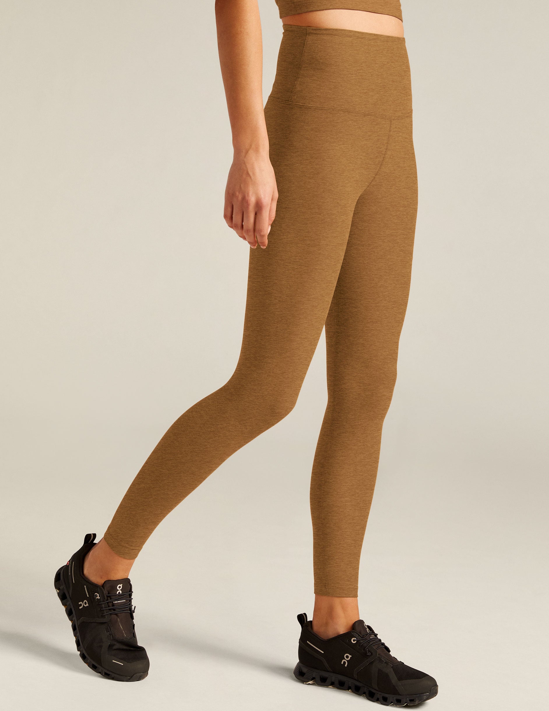 brown high-waisted midi leggings. 