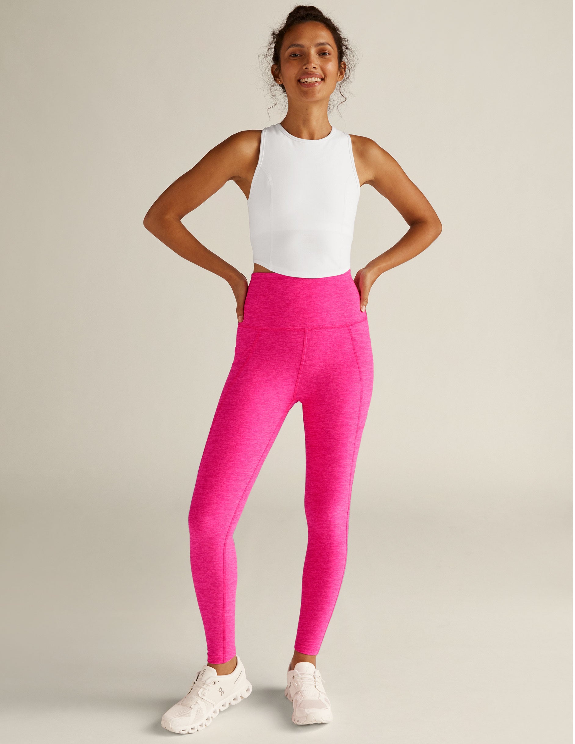 pink high-waisted midi pocket leggings. 