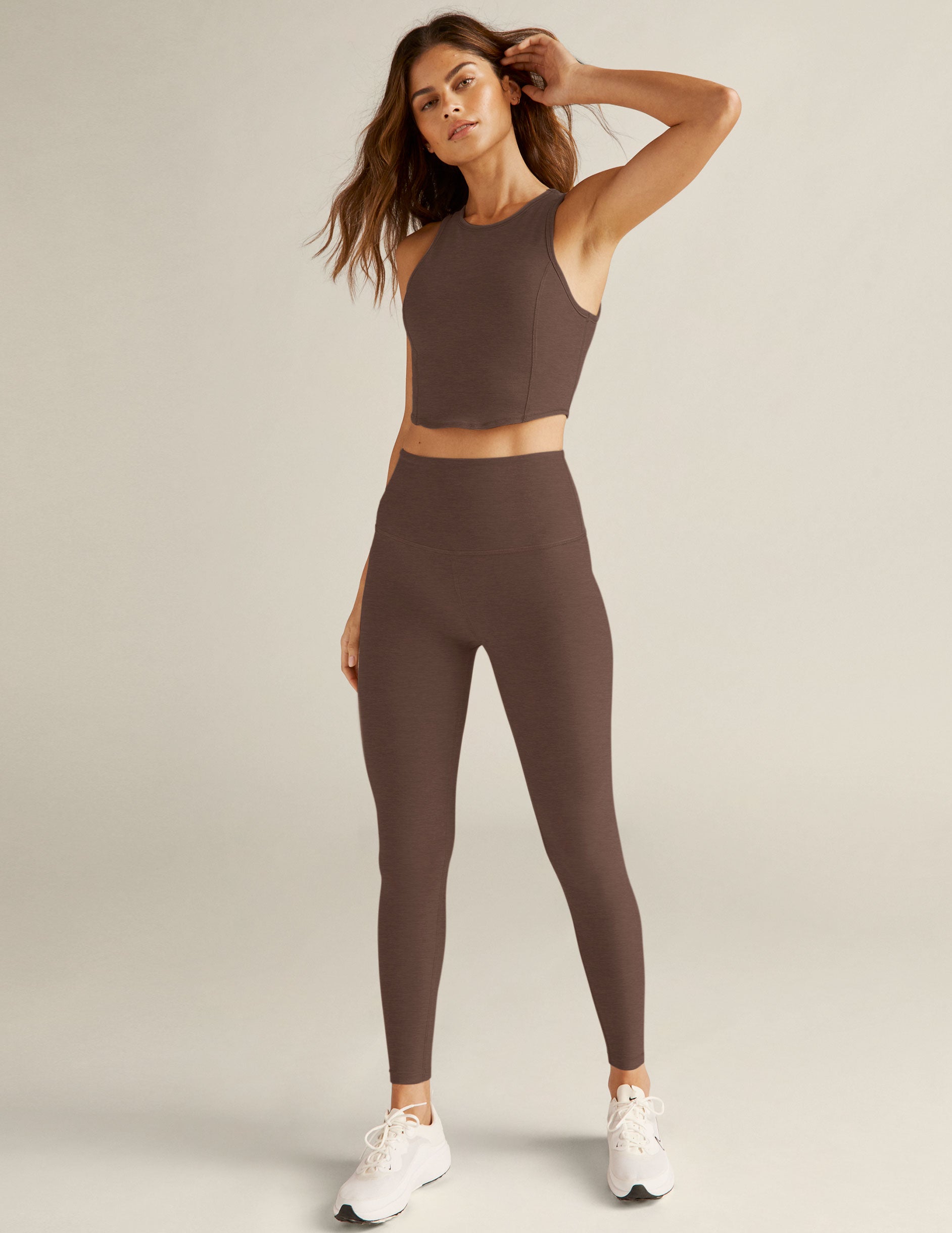 brown high-neck cropped tank.
