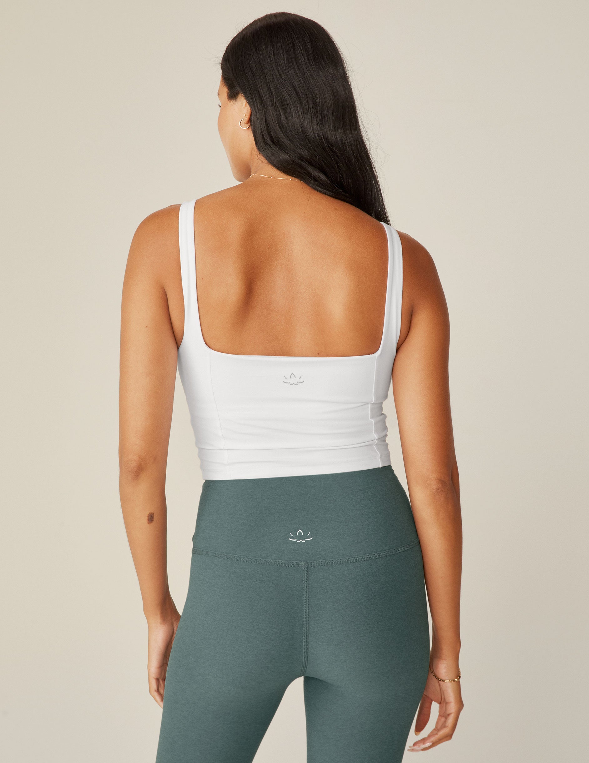 white square neck cropped tank with seams on the sides. 