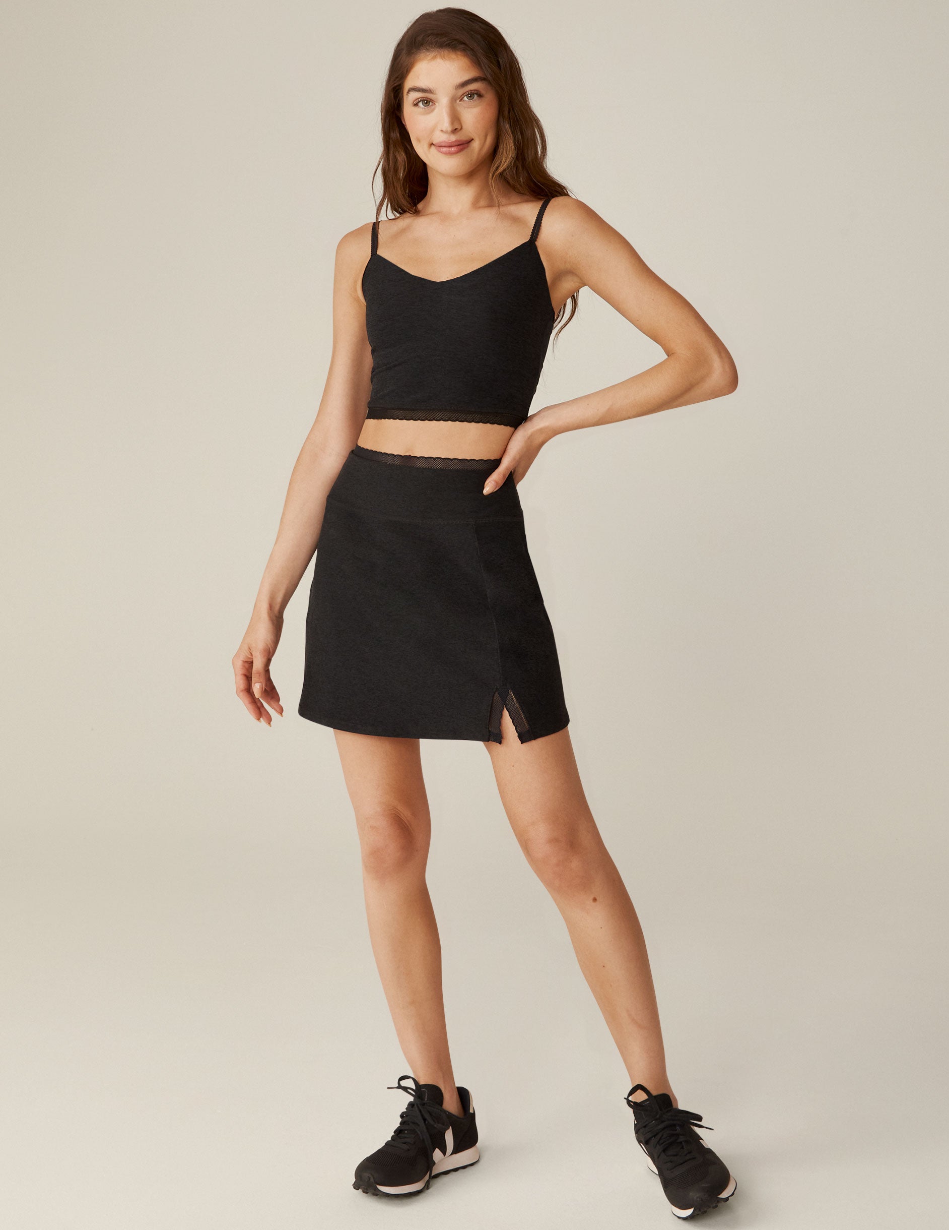 black v-neck cropped tank with lace trim. 