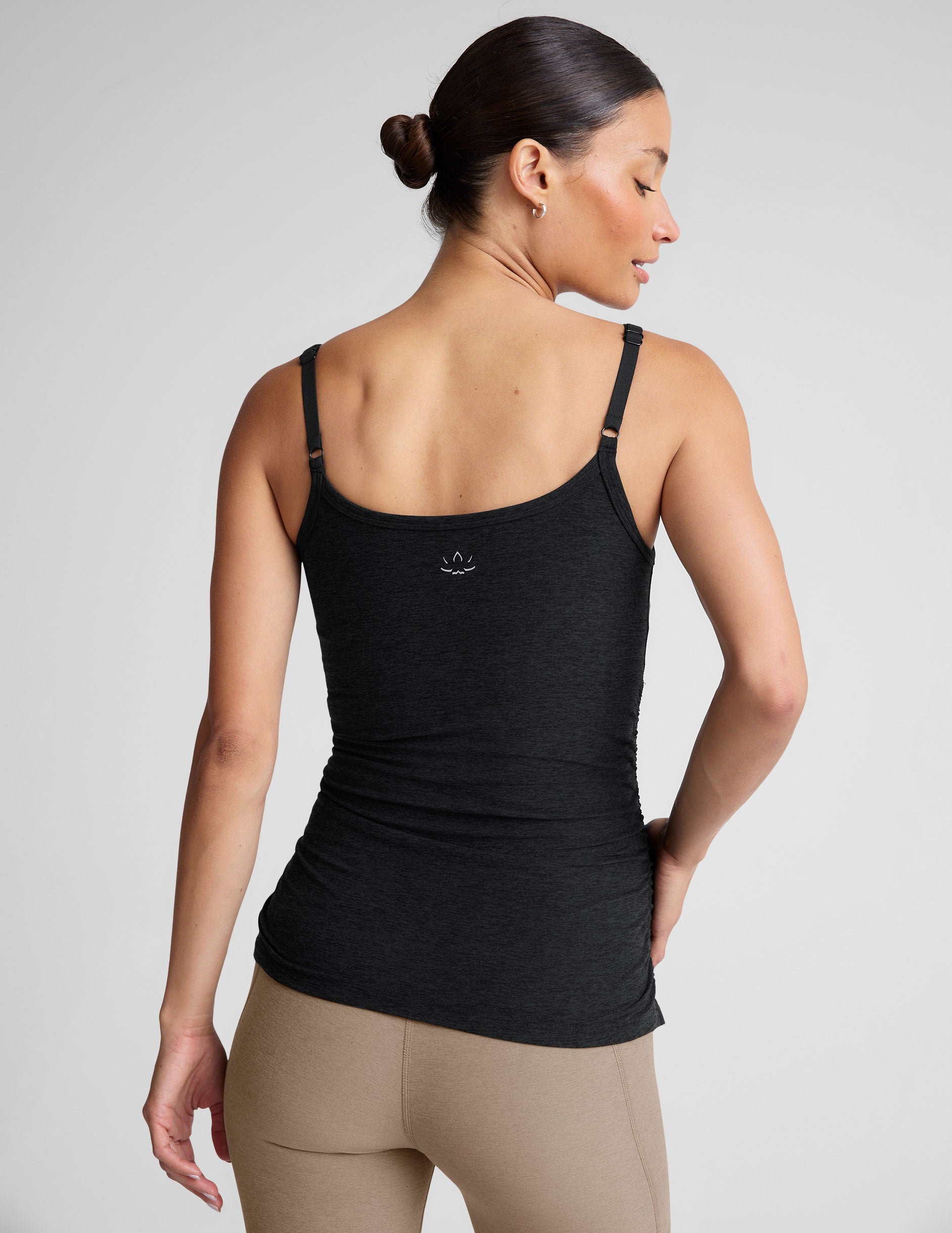 black nursing tank with adjustable straps.