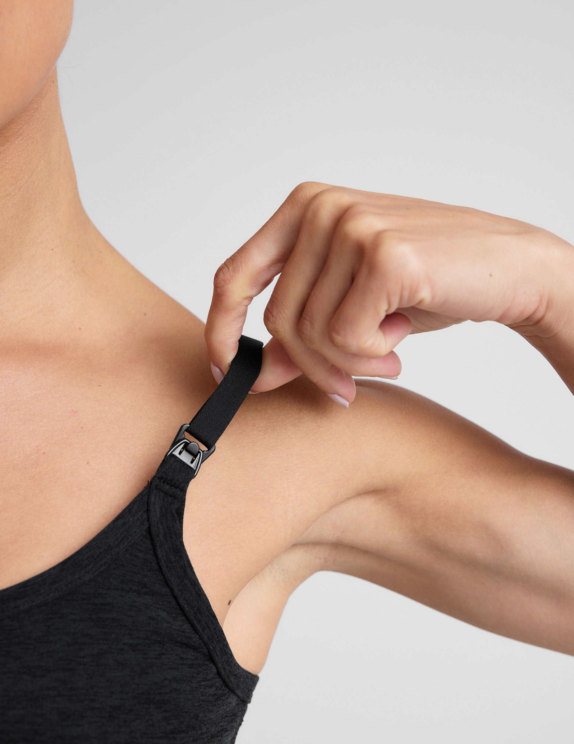 black nursing tank with adjustable straps.