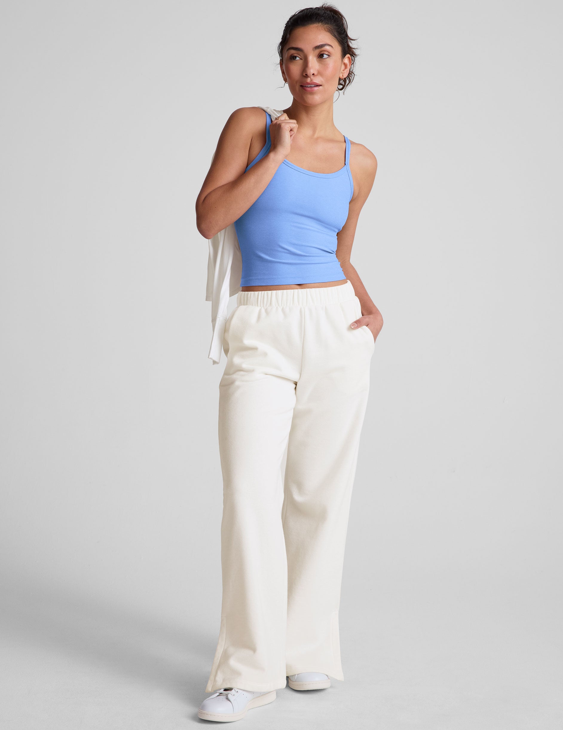 blue waist length tank top with slim adjustable straps.