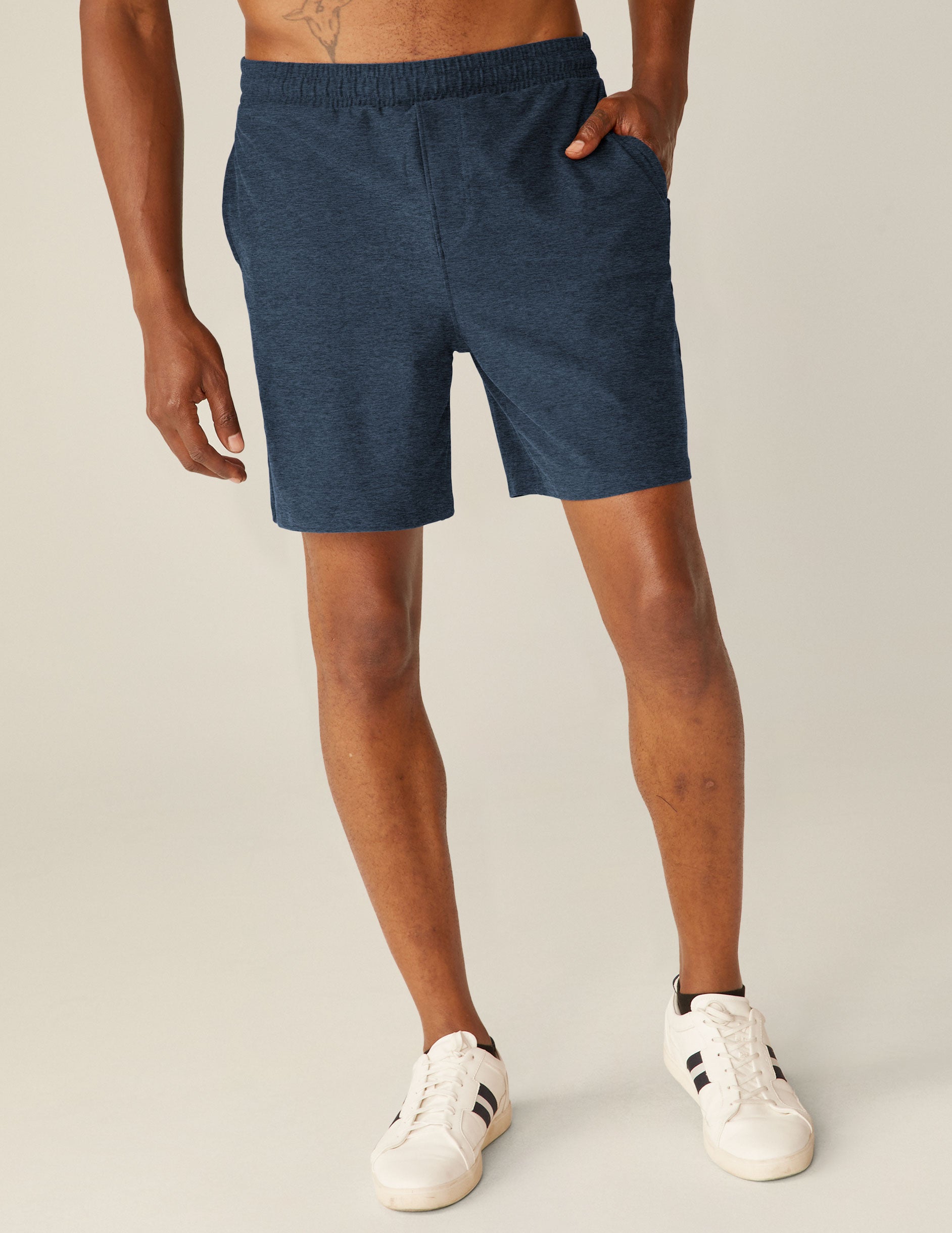 blue relaxed fit men's athleisure shorts with pockets.