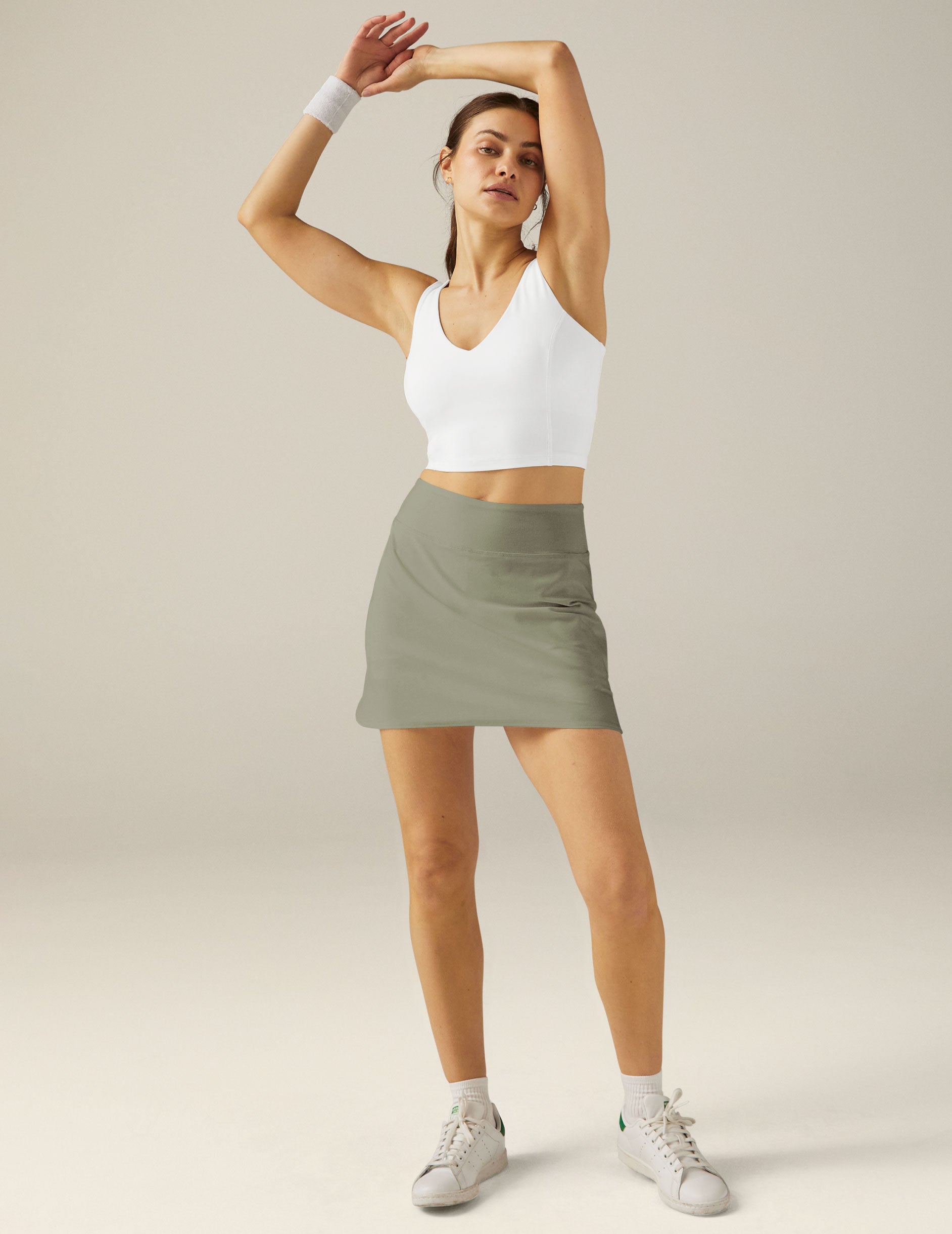 green mini skirt with interior shorts with pockets