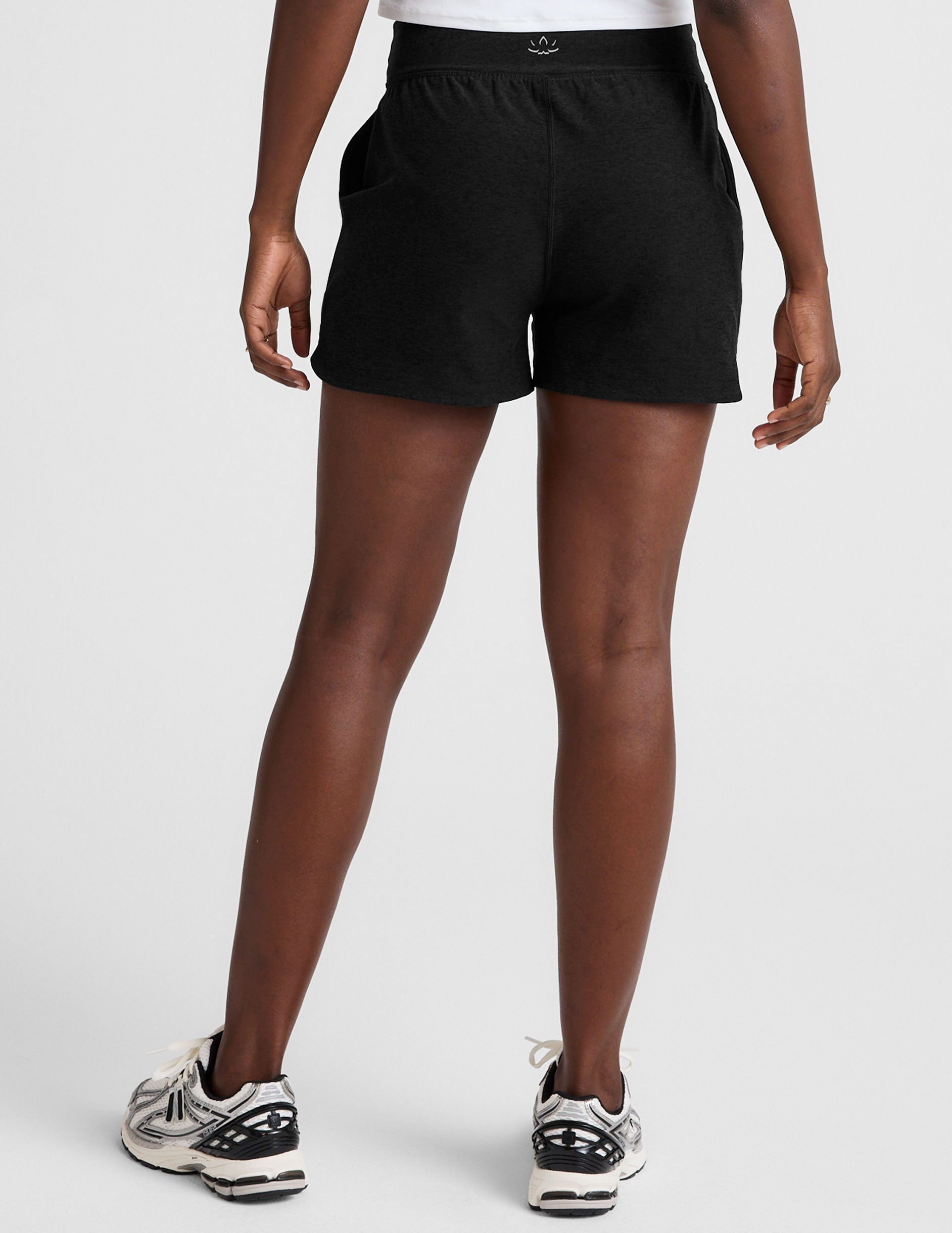 black 3" inseam shorts with pockets.