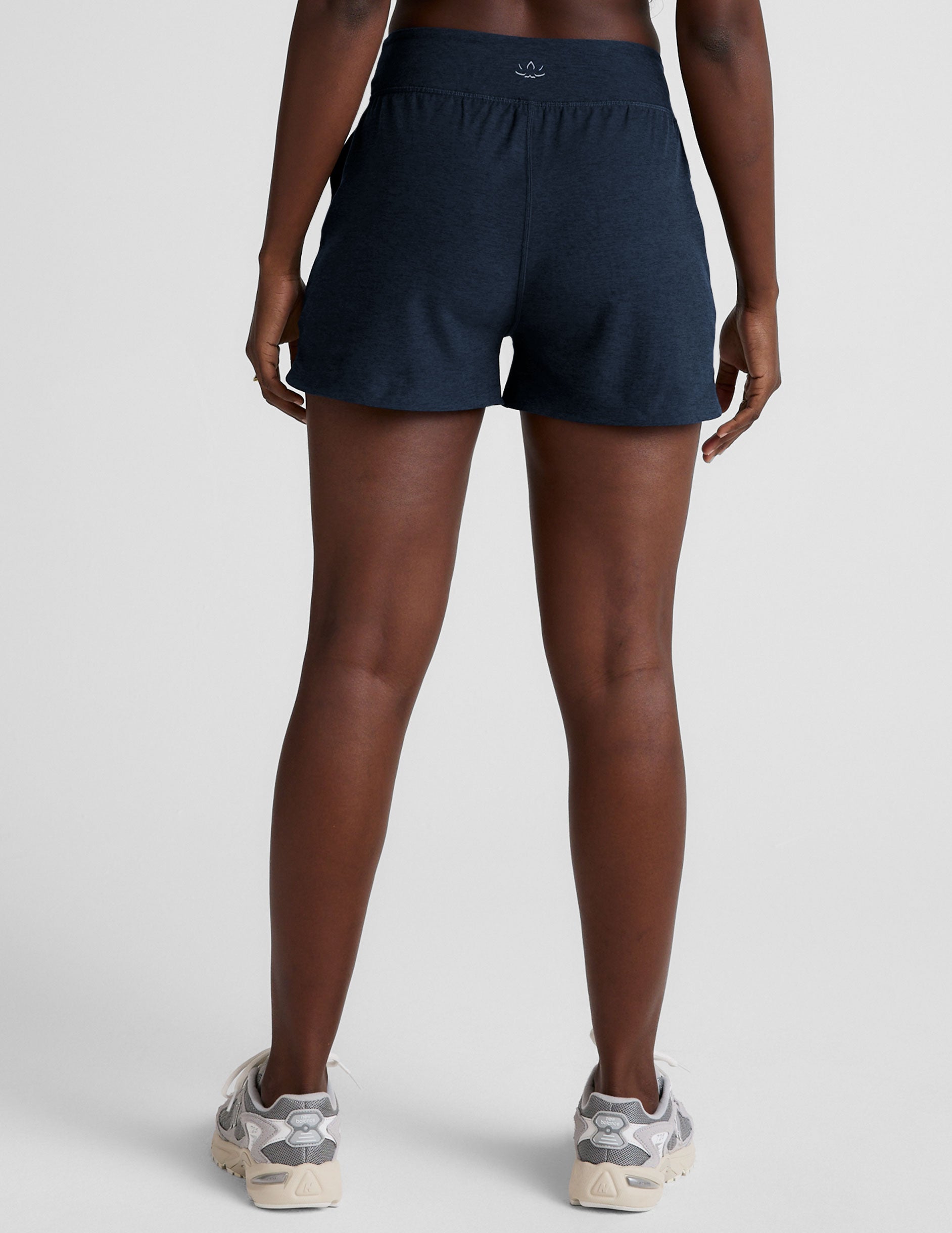 blue mid-rise spacedye shorts with pockets.