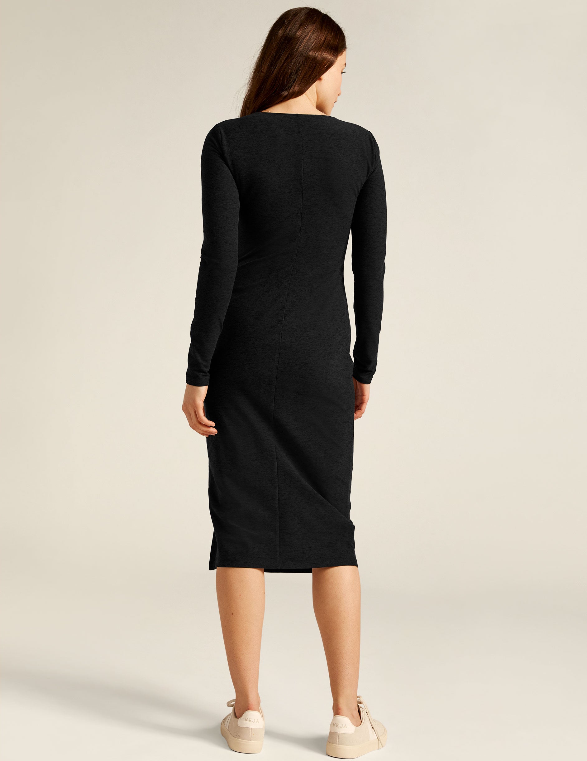 black long sleeve square neck midi dress with a front side slit. 