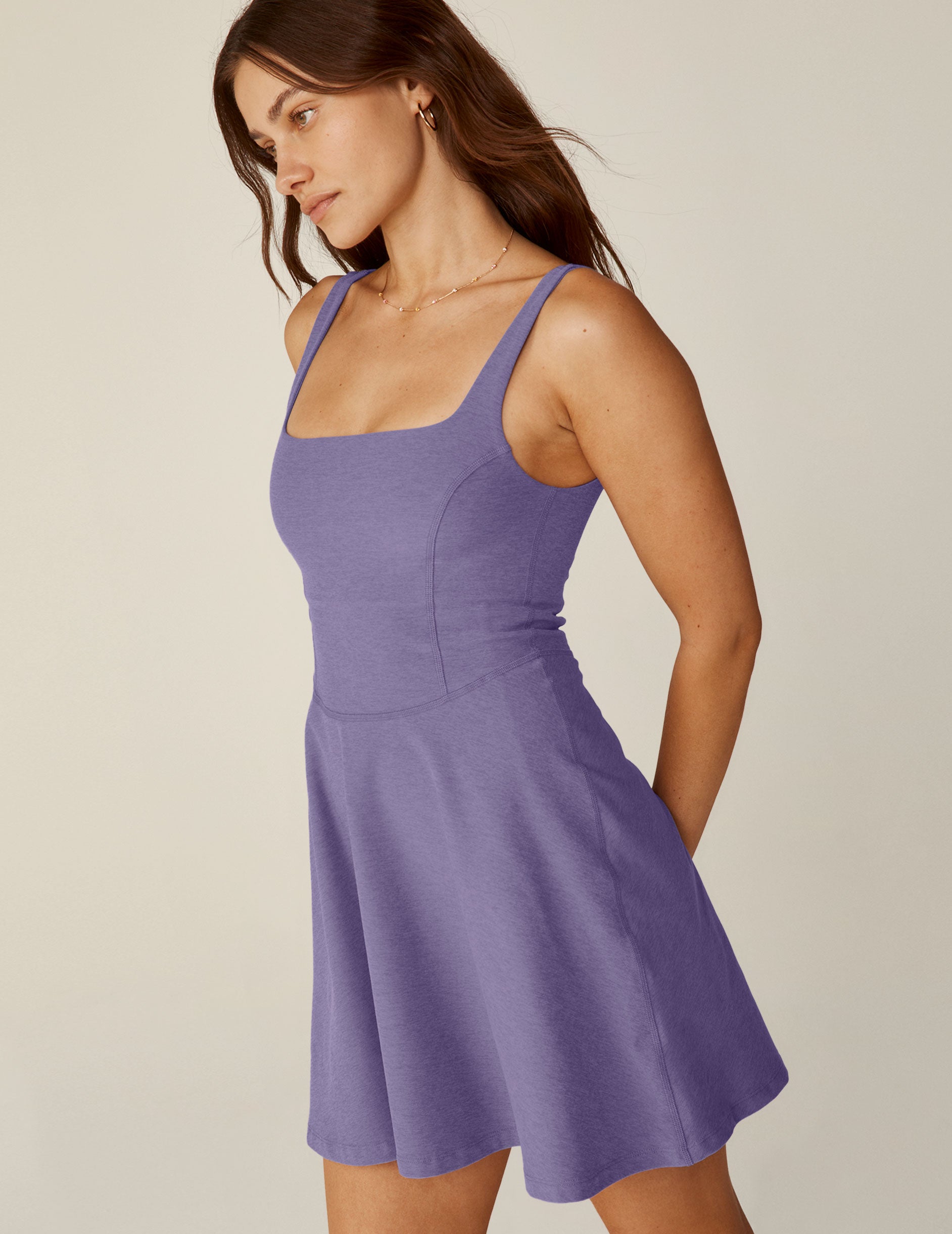 purple spacedye mini dress with a square neckline and built-in shorts with pockets. 