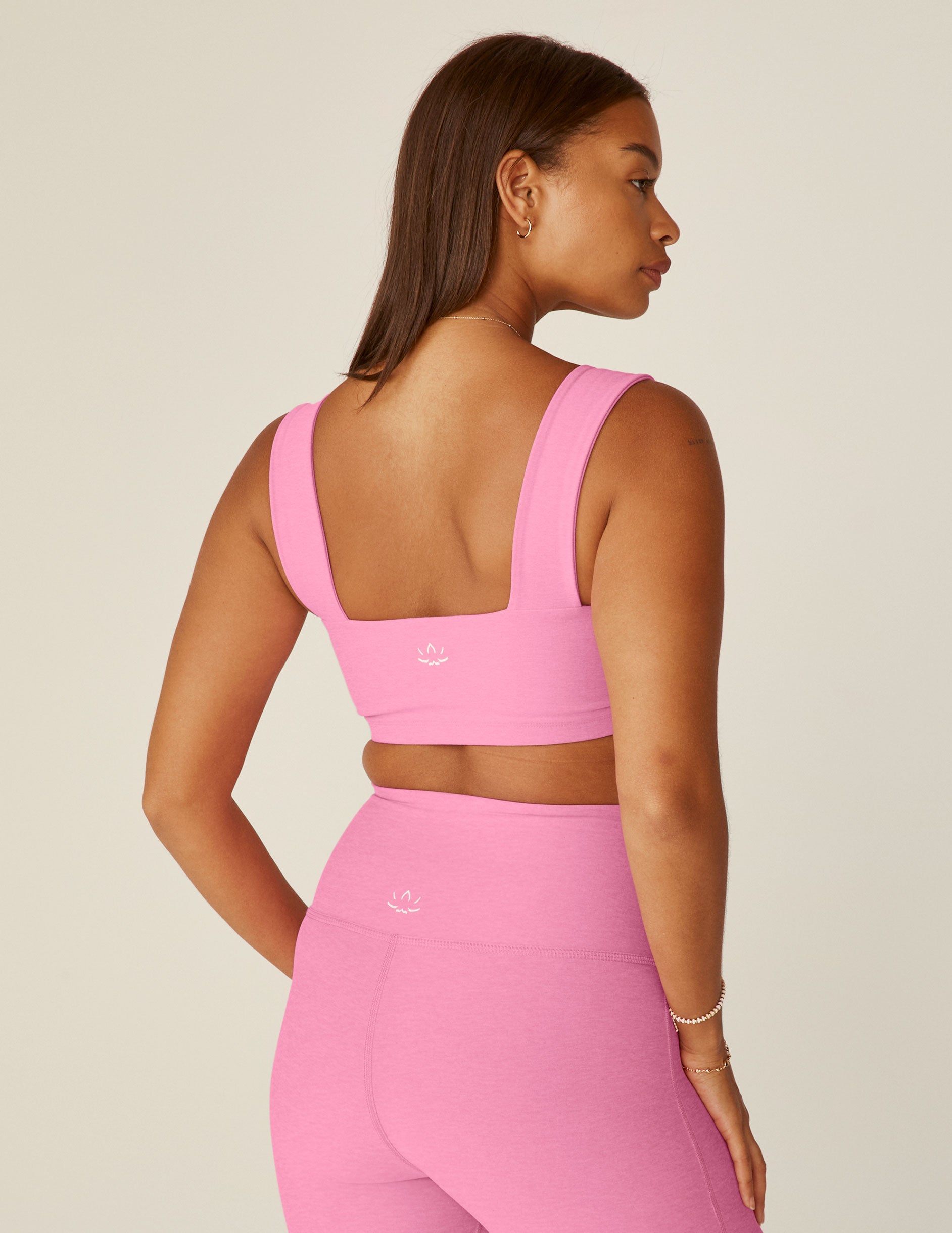 pink square neck bra top with contour seams. 
