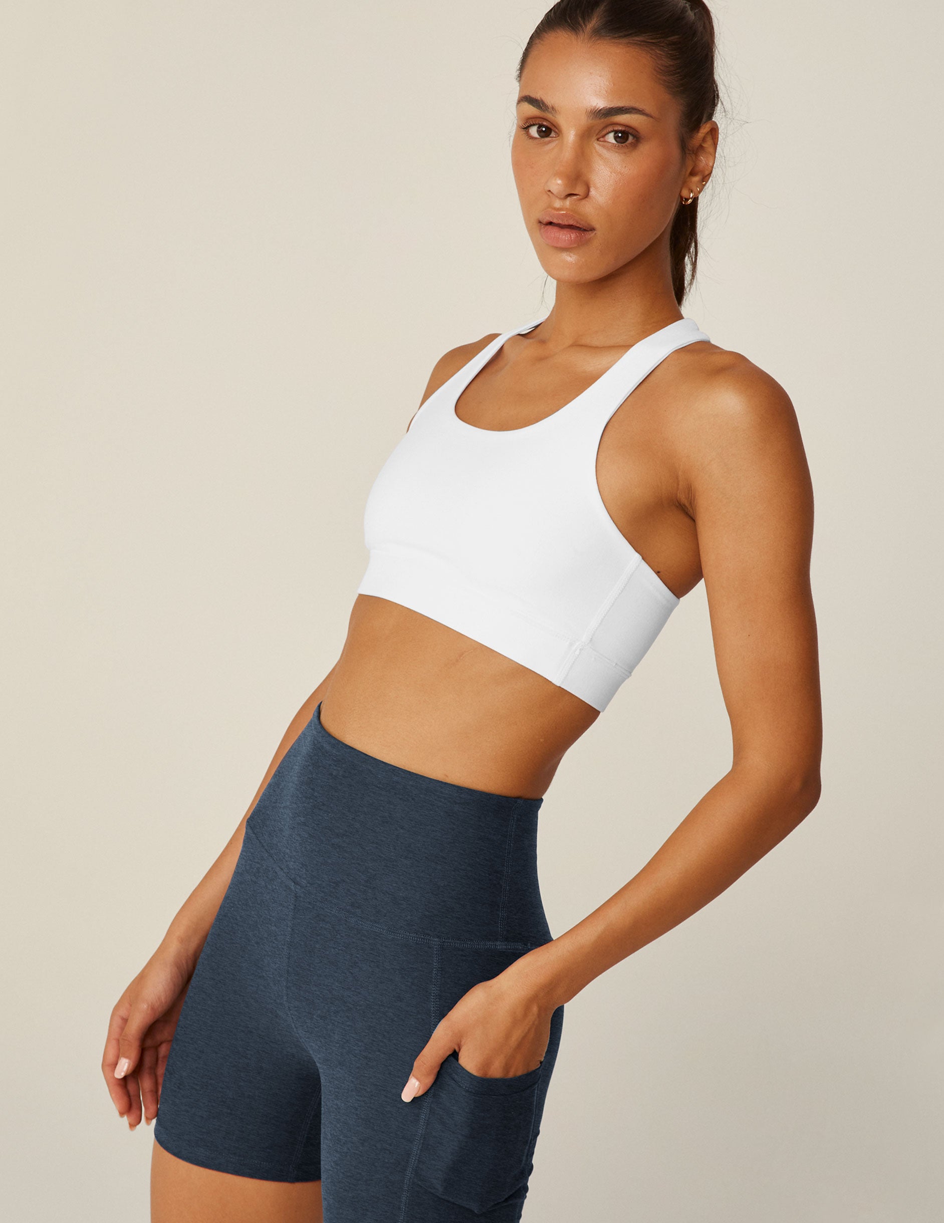 white bra top with a crossover detailing in the back.