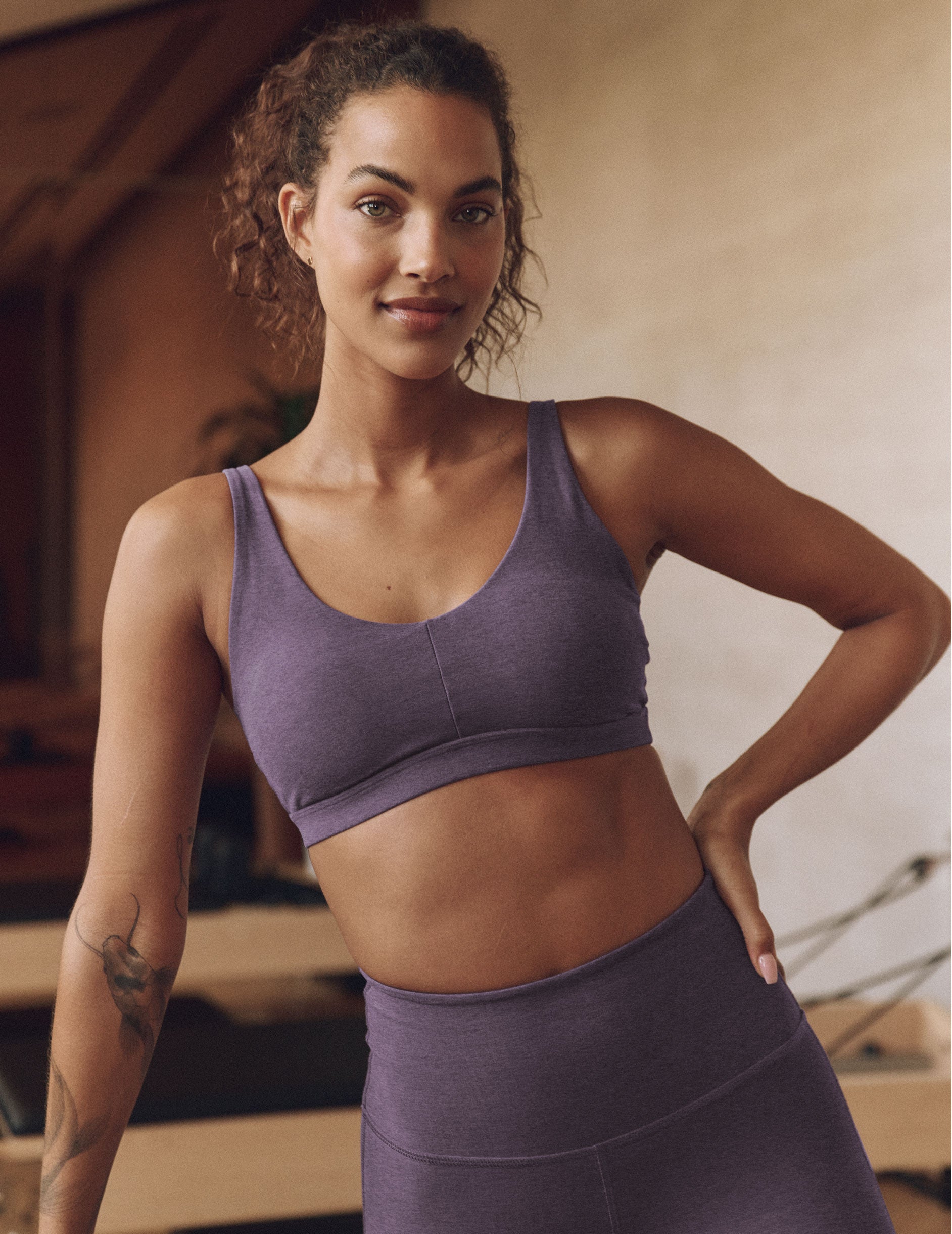 purple sports bra with remove-able pads and adjustable straps. 