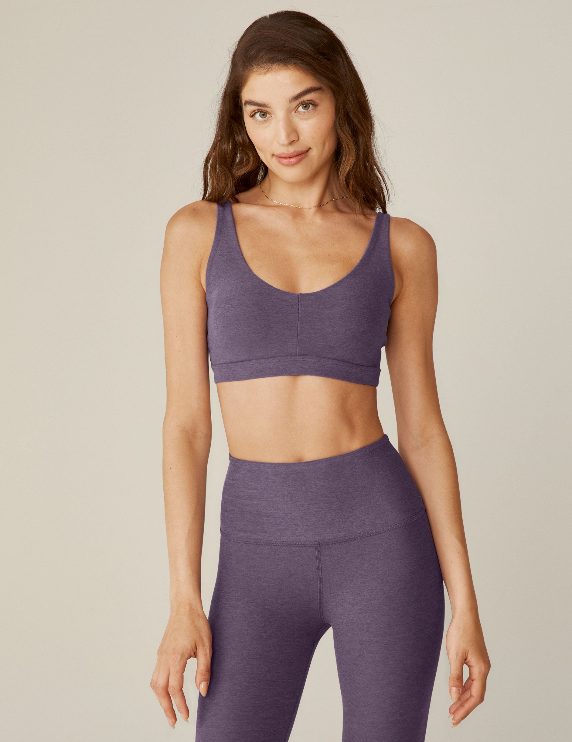 purple sports bra with remove-able pads and adjustable straps. 