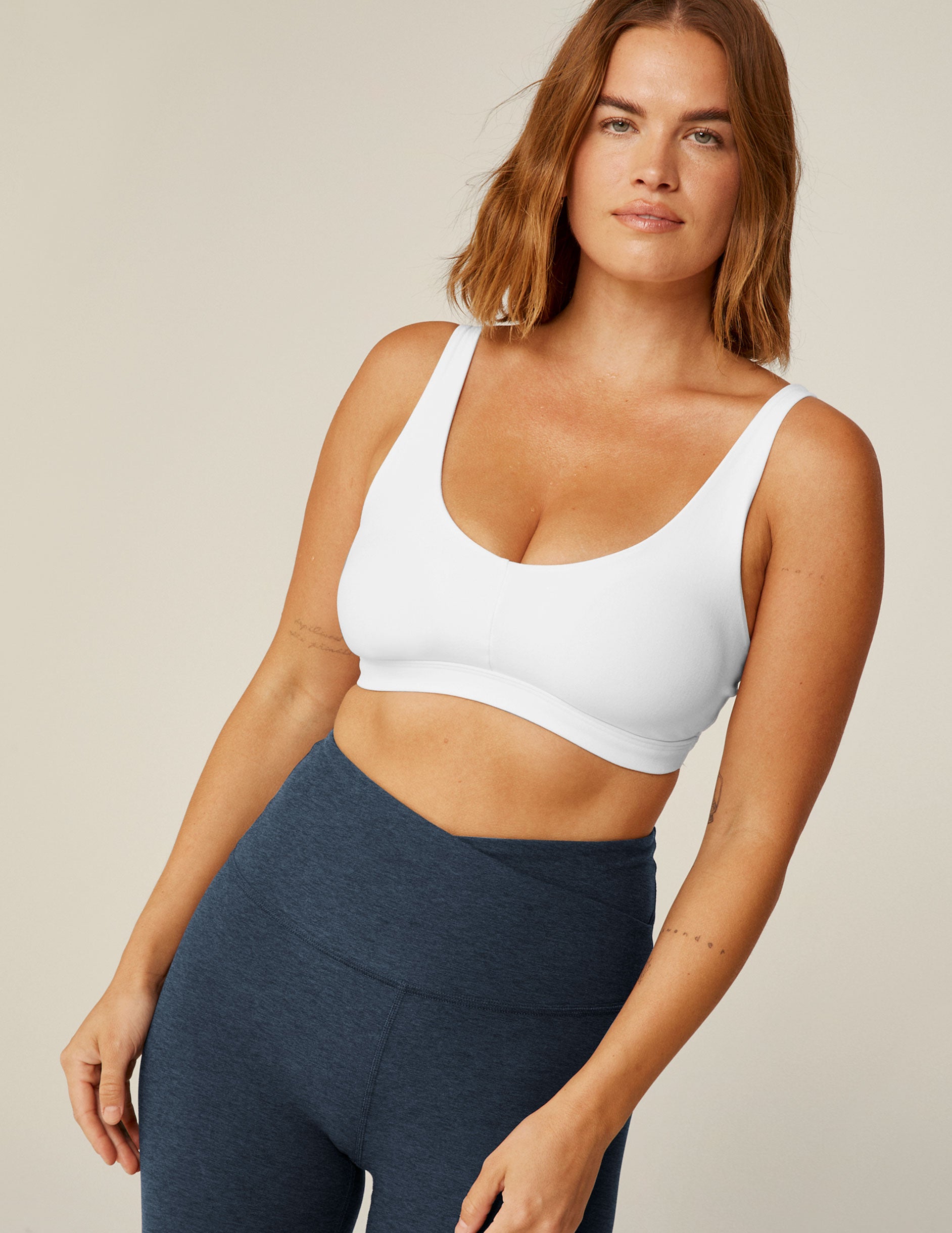 white v-neck bra top with removeable pads and adjustable straps.
