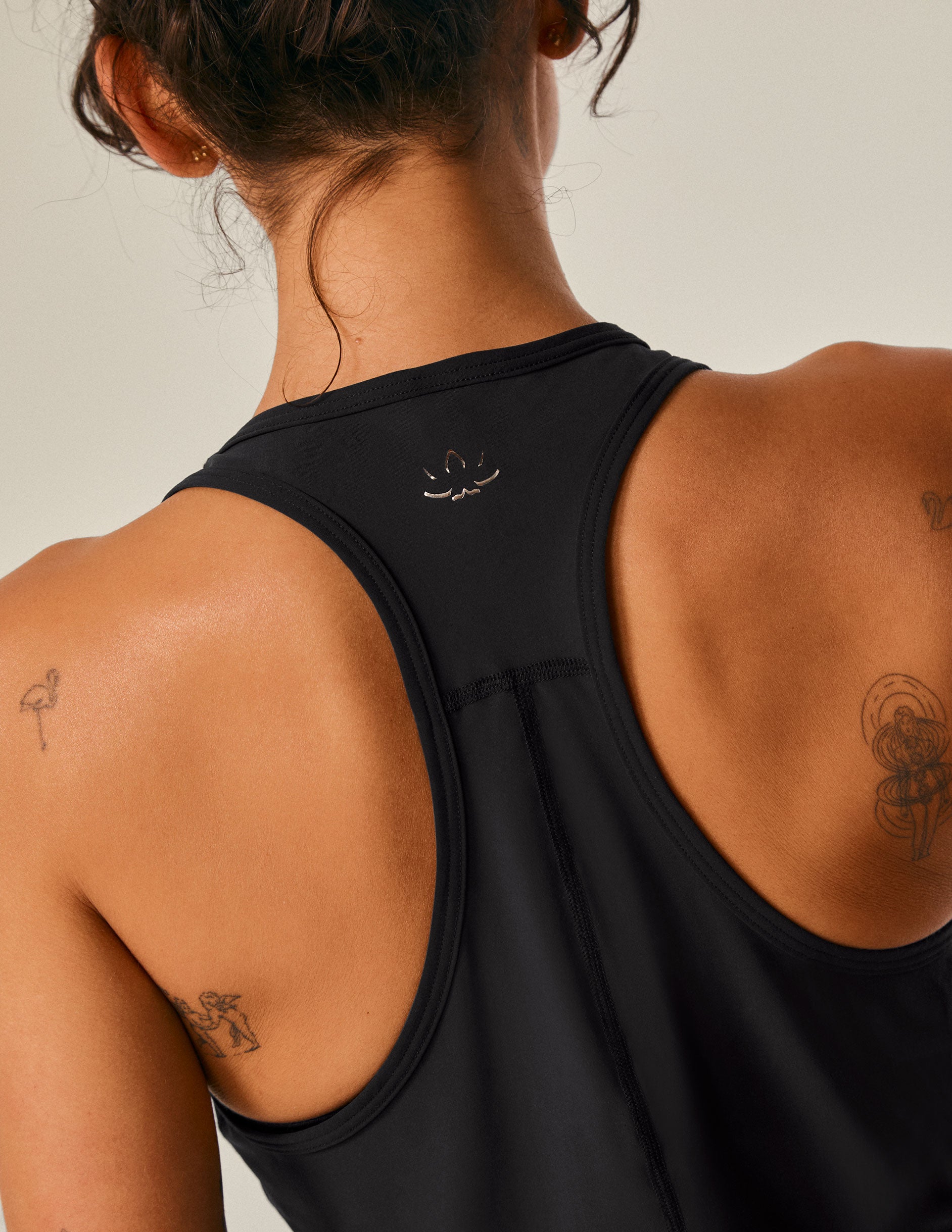 black scoop neck racerback tank top.