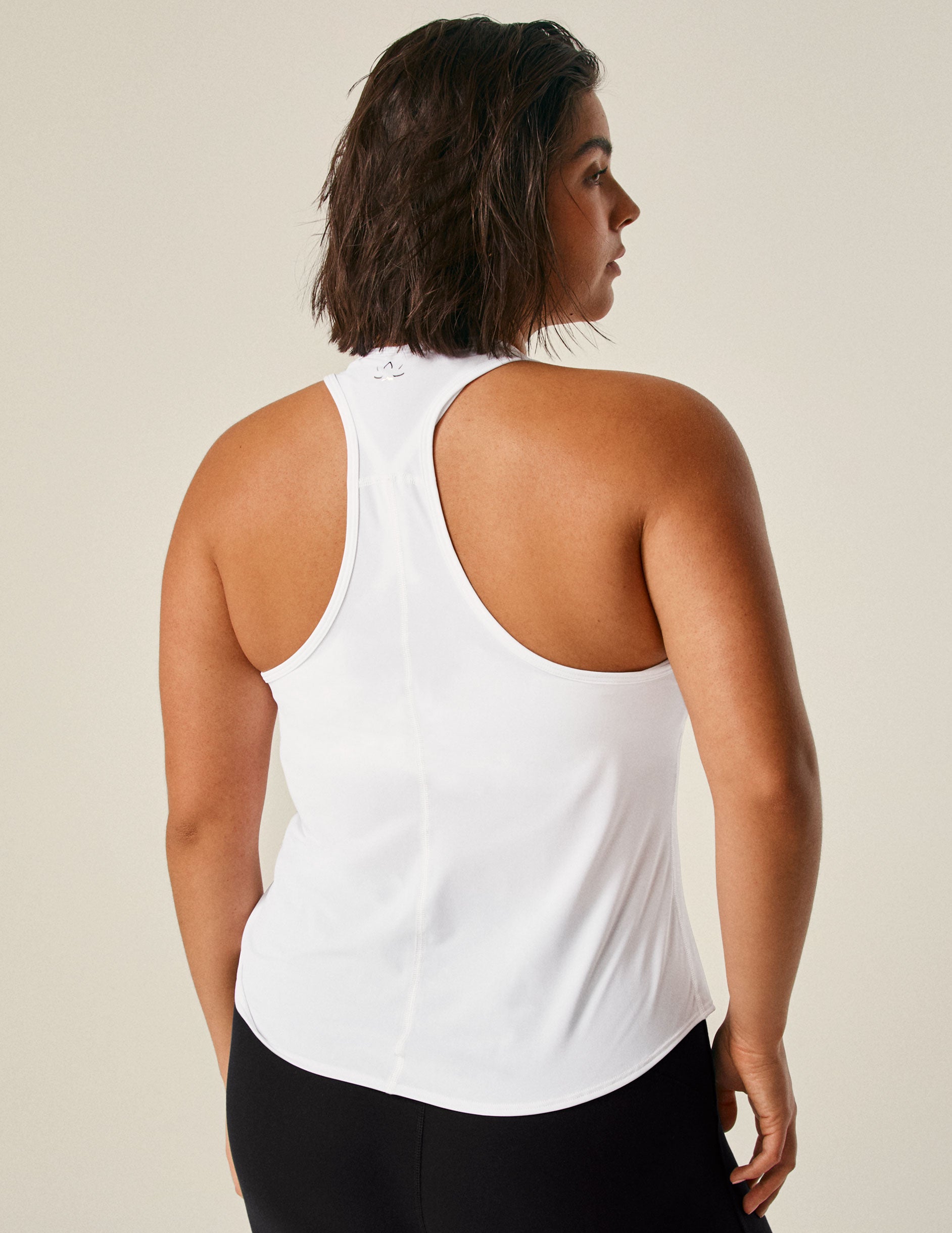 white scoop neck racerback tank top.