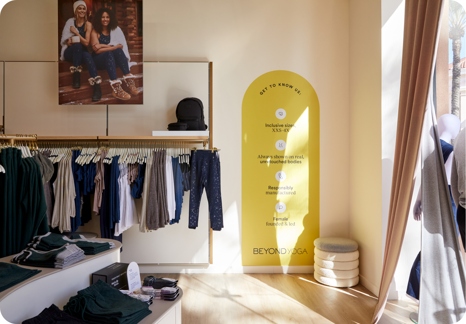 Indoor image of Irvine store with clothing and marketing imagery