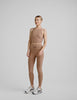 brown high-waisted midi leggings with a drawstring at waistband. 
