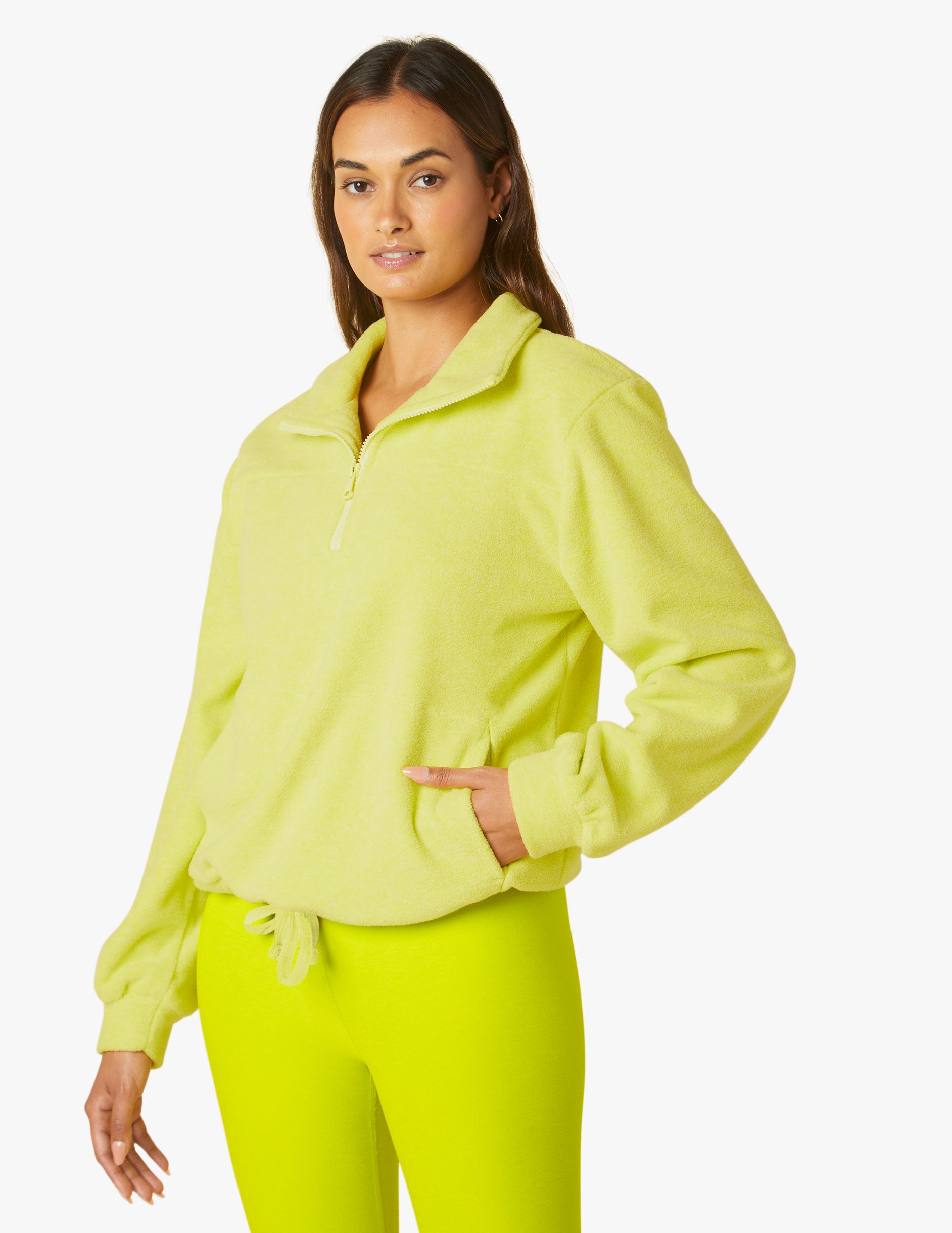 neon yellow 3/4 zip up jacket with drawstring at waist
