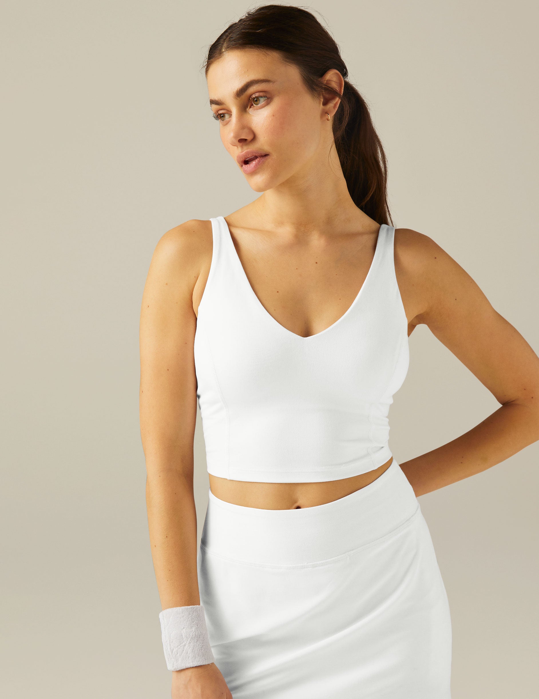 white v neck crop top with criss cross back detail