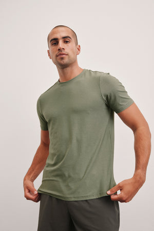 model is wearing a green men's t-shirt. 