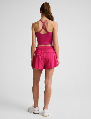Rear view of woman wearing Pink Solemate™ 2.5