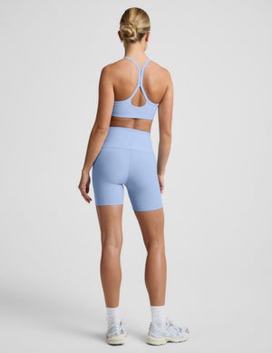 Woman wearing Blue Spacedye™ Keep Pace 5