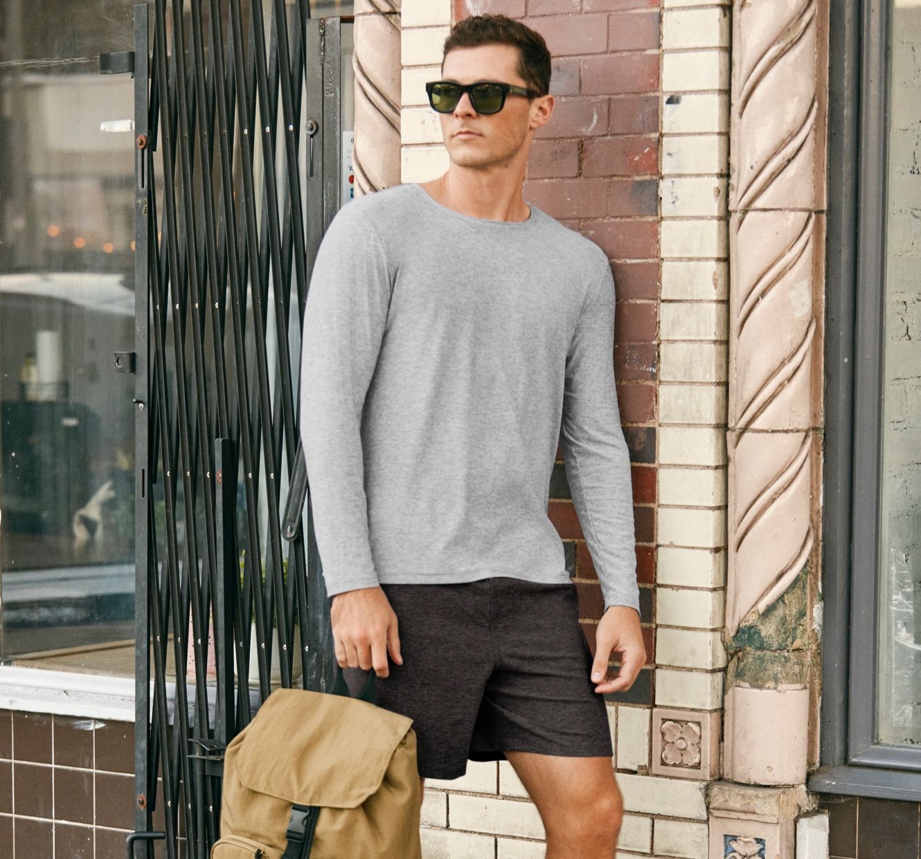 black mens shorts paired with gray men long sleeve top