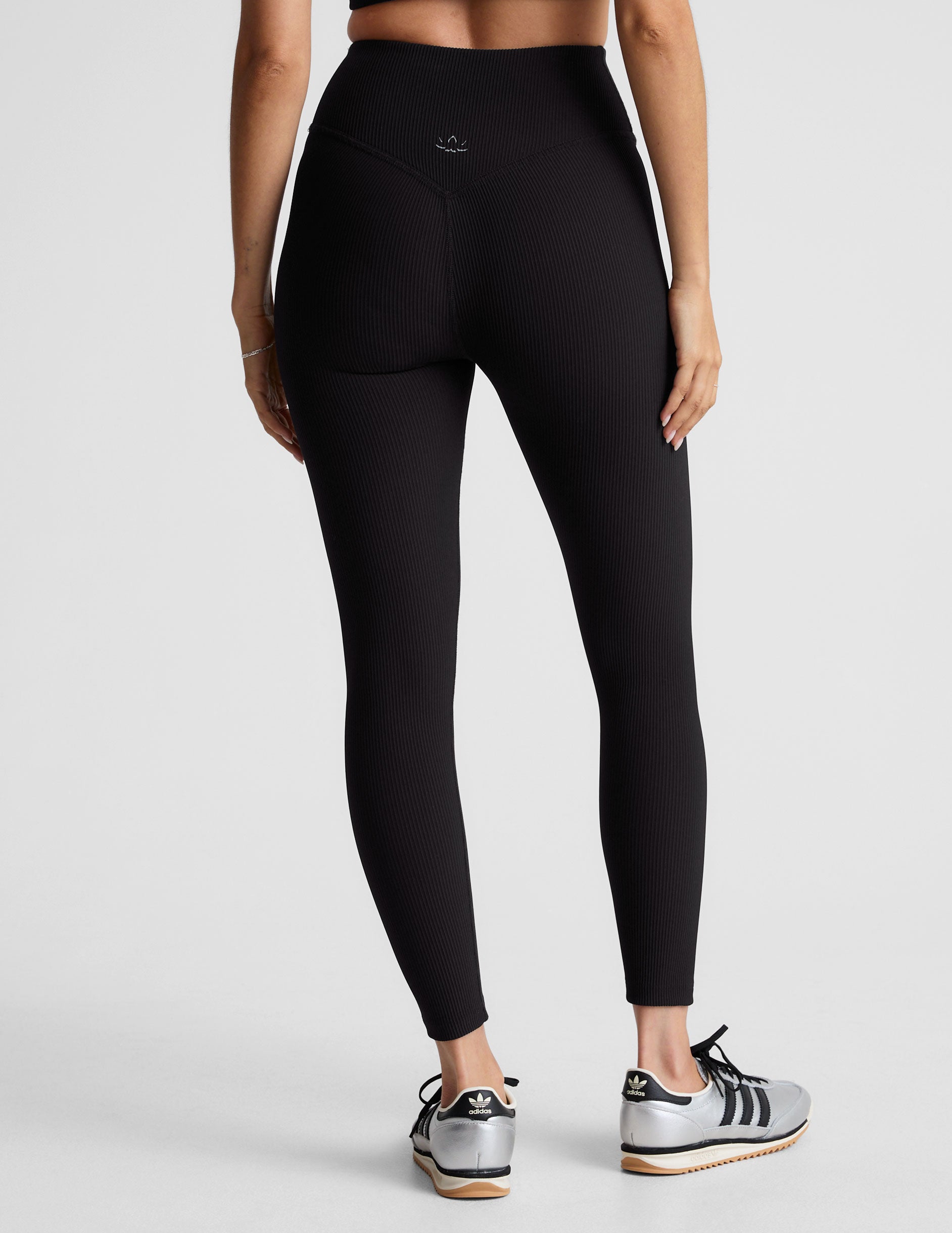 black midi length ribbed leggings with a 4" waistband. 