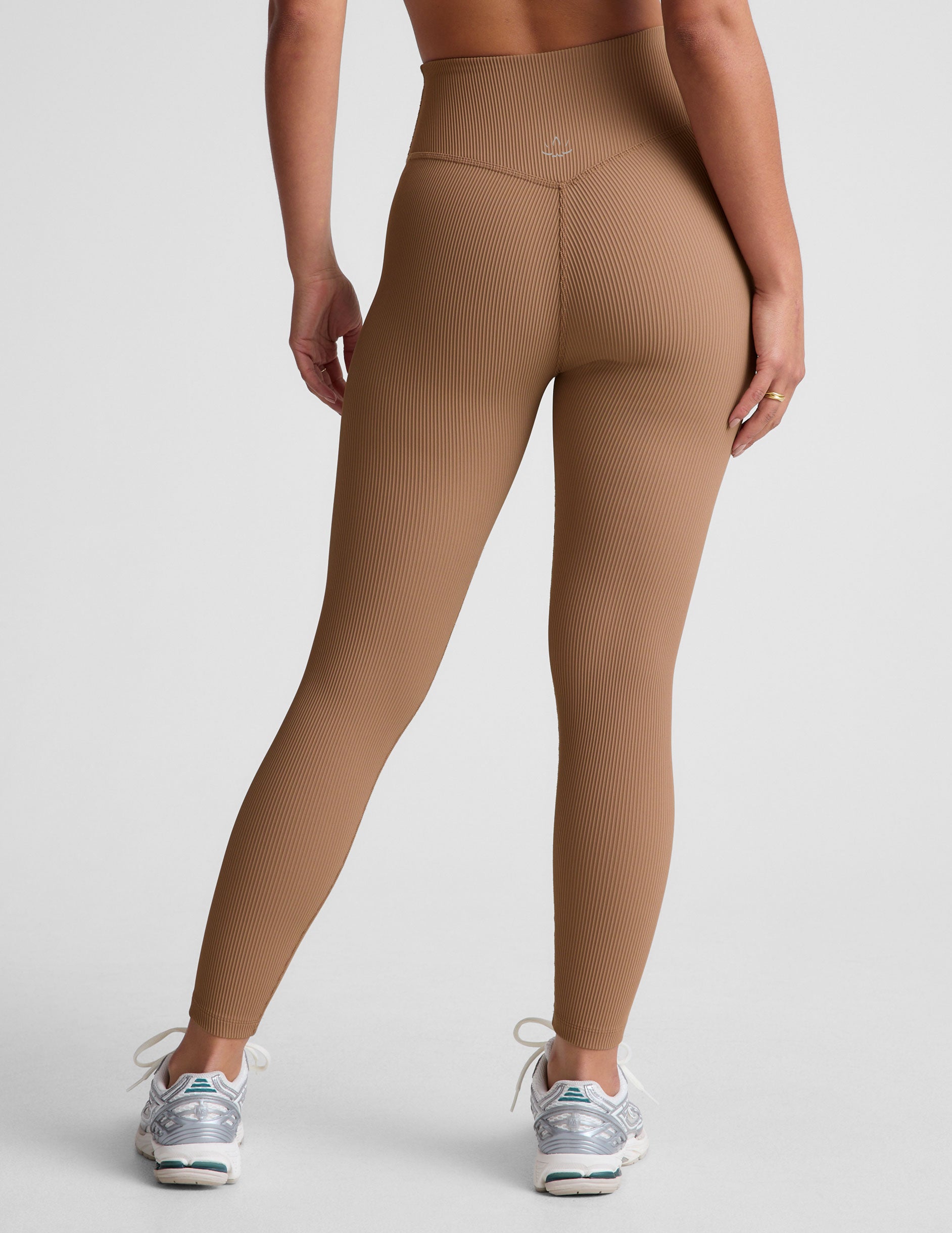 brown midi length leggings with a 4" waistband and no front rise seam. 