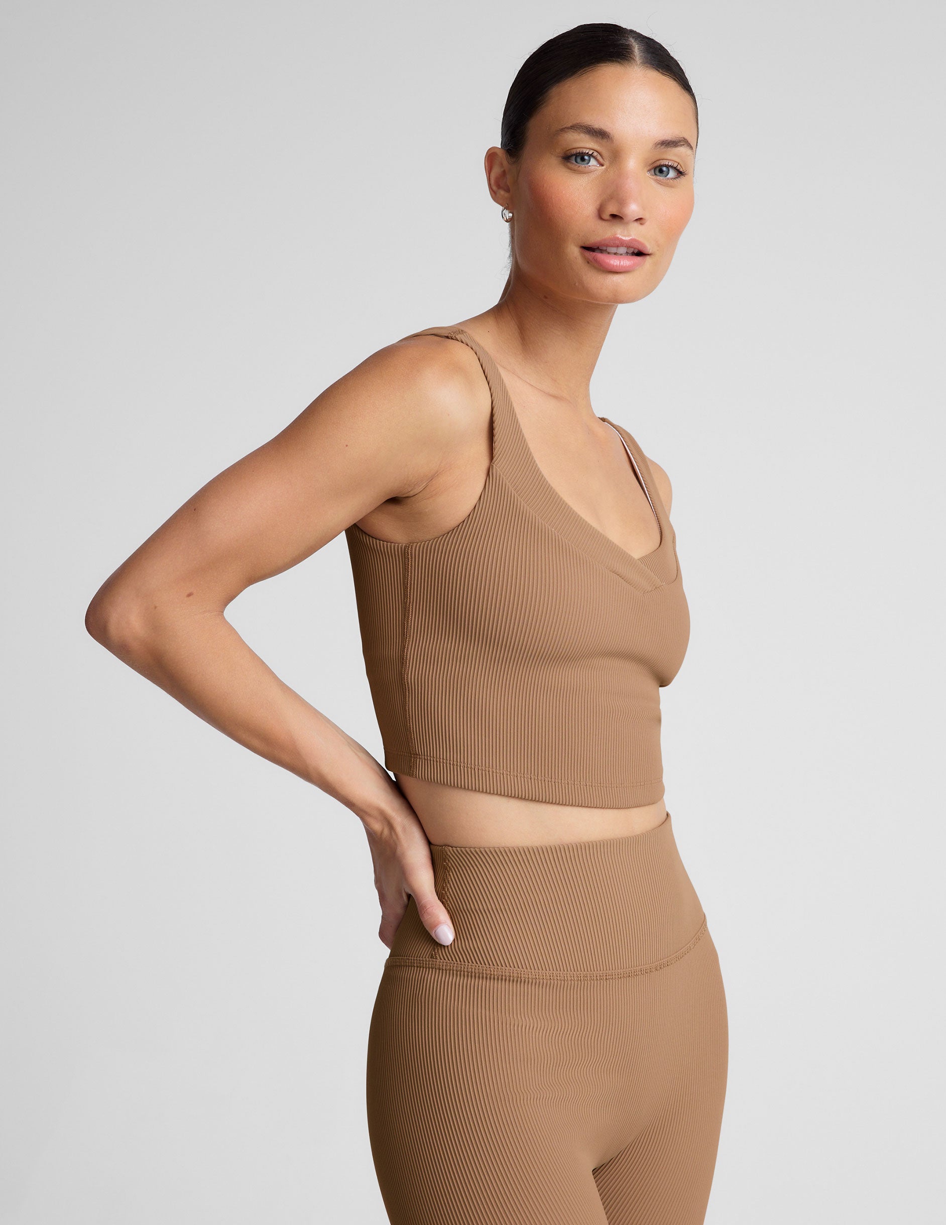 brown ribbed cropped tank with front and back v necklines. 