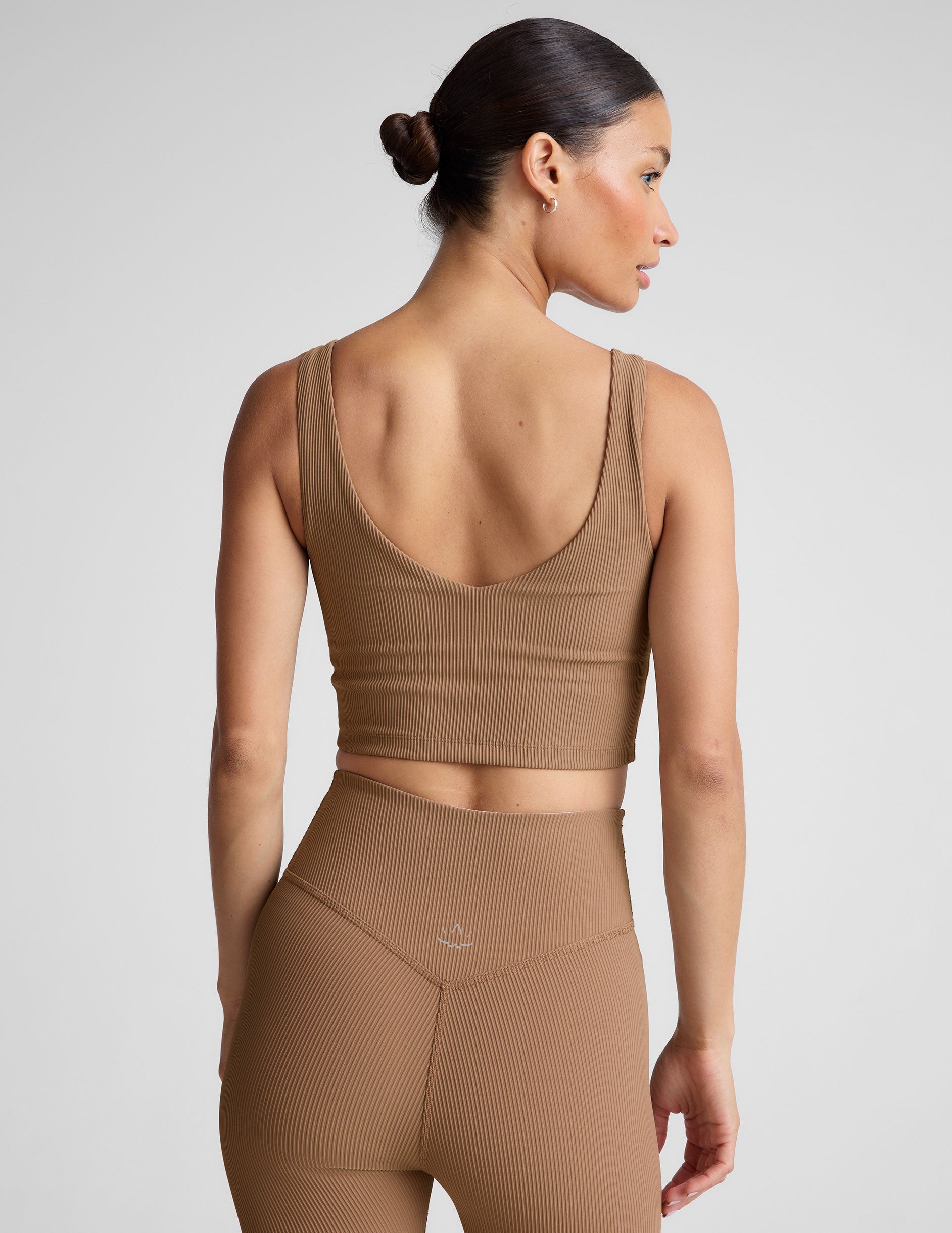 brown ribbed cropped tank with front and back v necklines. 