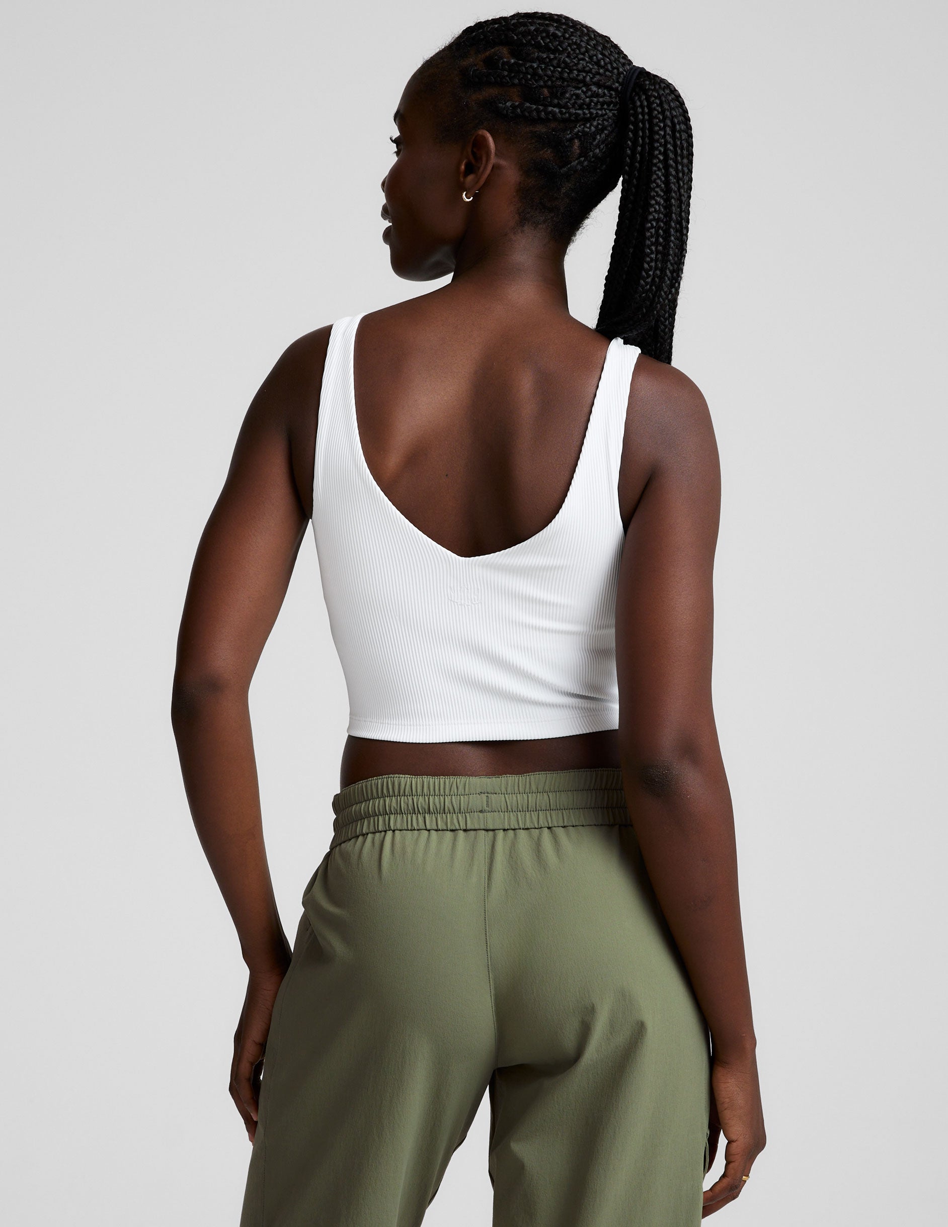 white ribbed cropped tank with a front and back soft v neckline. 