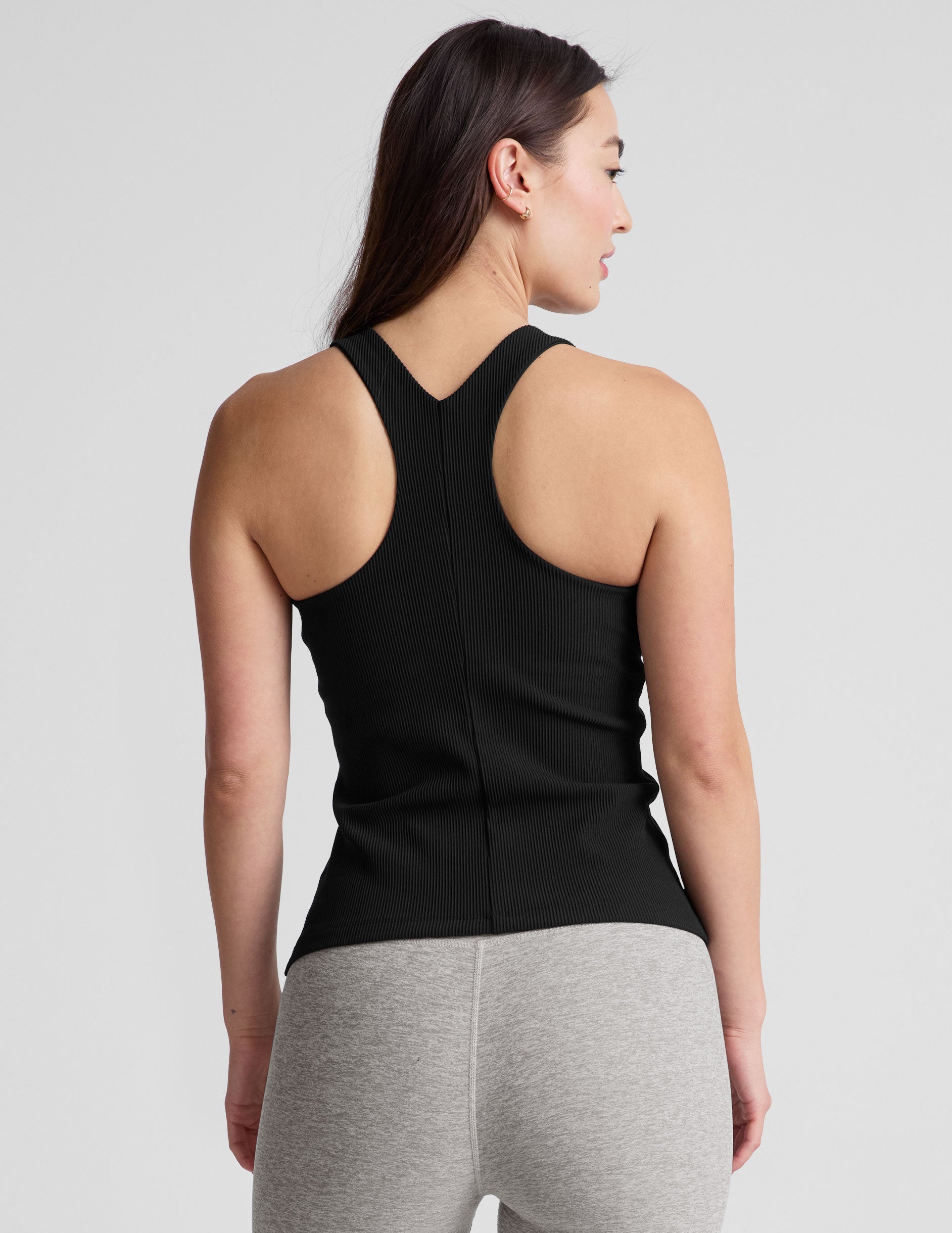 black ribbed high-neck, racerback, classic length tank top. 