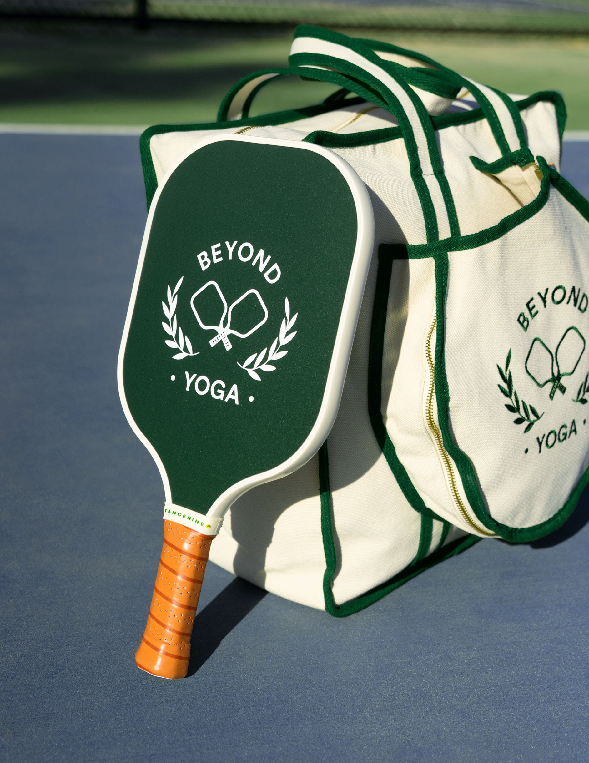 green and white beyond yoga pickleball tote bag. 