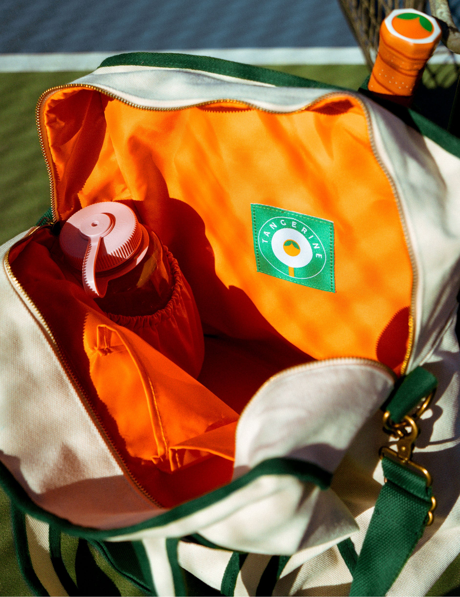 green and white beyond yoga pickleball tote bag. 