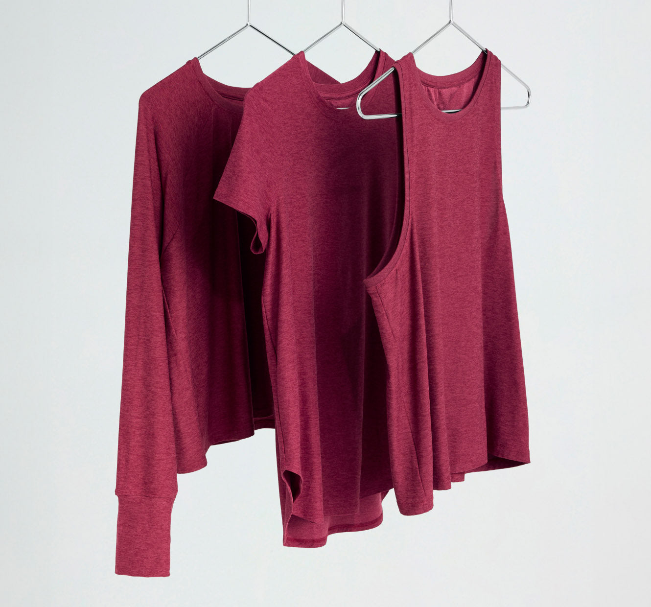 red product assortment  tank top, short sleeve top and long sleeve top. 