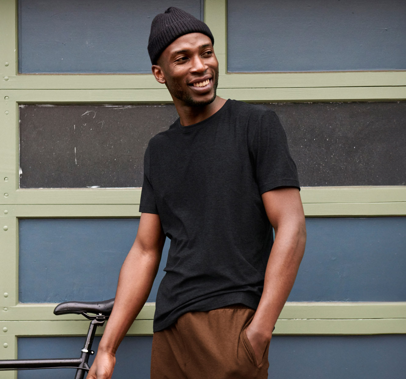 black men short sleeve shirt with brown joggers