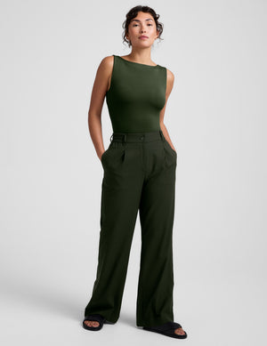 green boat neck tank top with a square back neckline. 