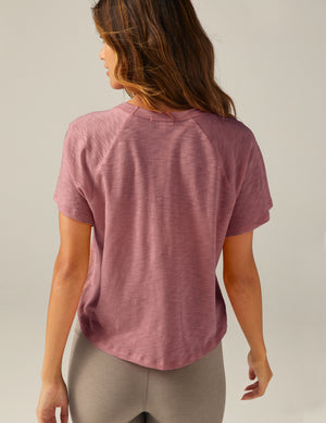 purple short sleeve scoop neck high-low t-shirt. 